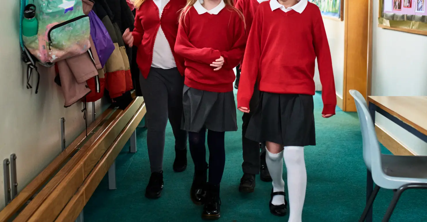 From September, most schools will only be allowed to require pupils to have a maximum of three compulsory branded uniform and PE kit items (Getty Stock Images)