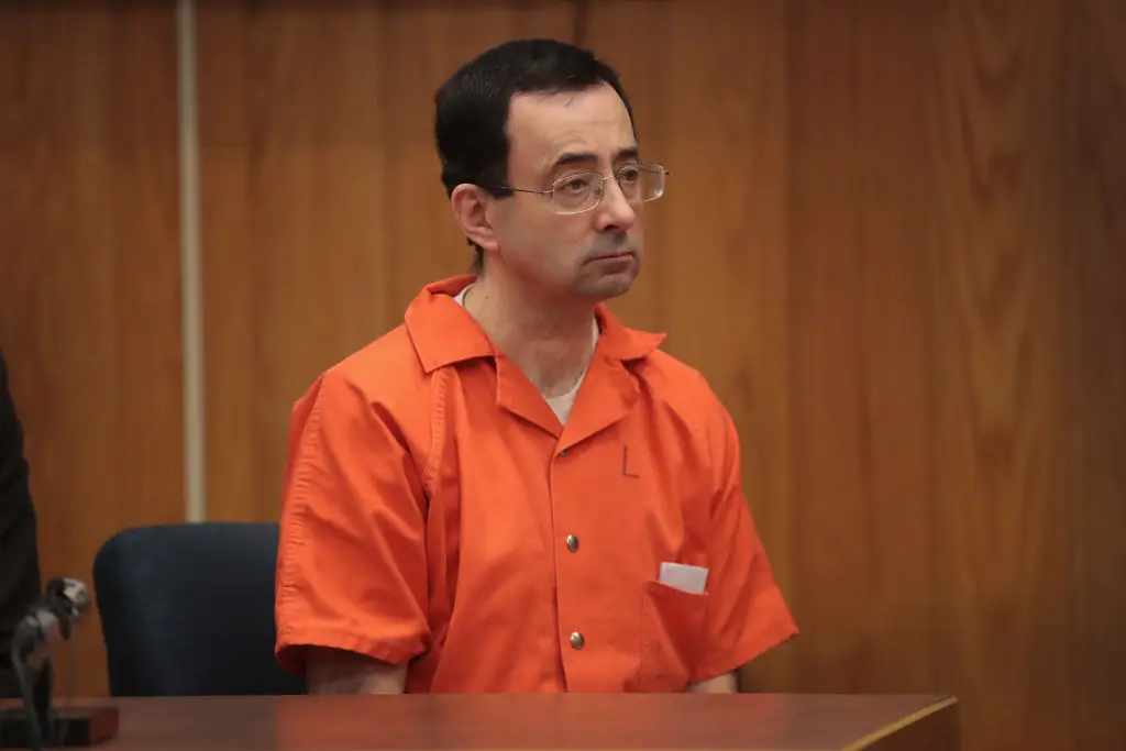 Larry Nassar is accused of sexual abuse by more than 330 women and is currently behind bars (Scott Olson/Getty Images)