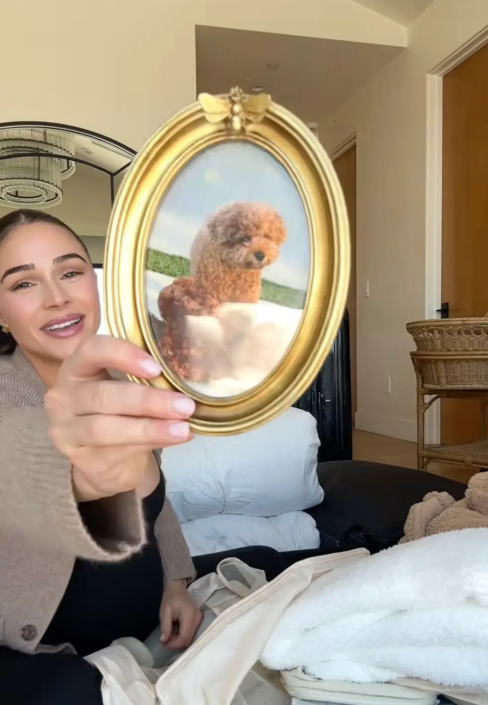 Among the items Culpo packed was a framed picture of her dog and flameless flickering candles (oliviadangerculpo/TikTok)