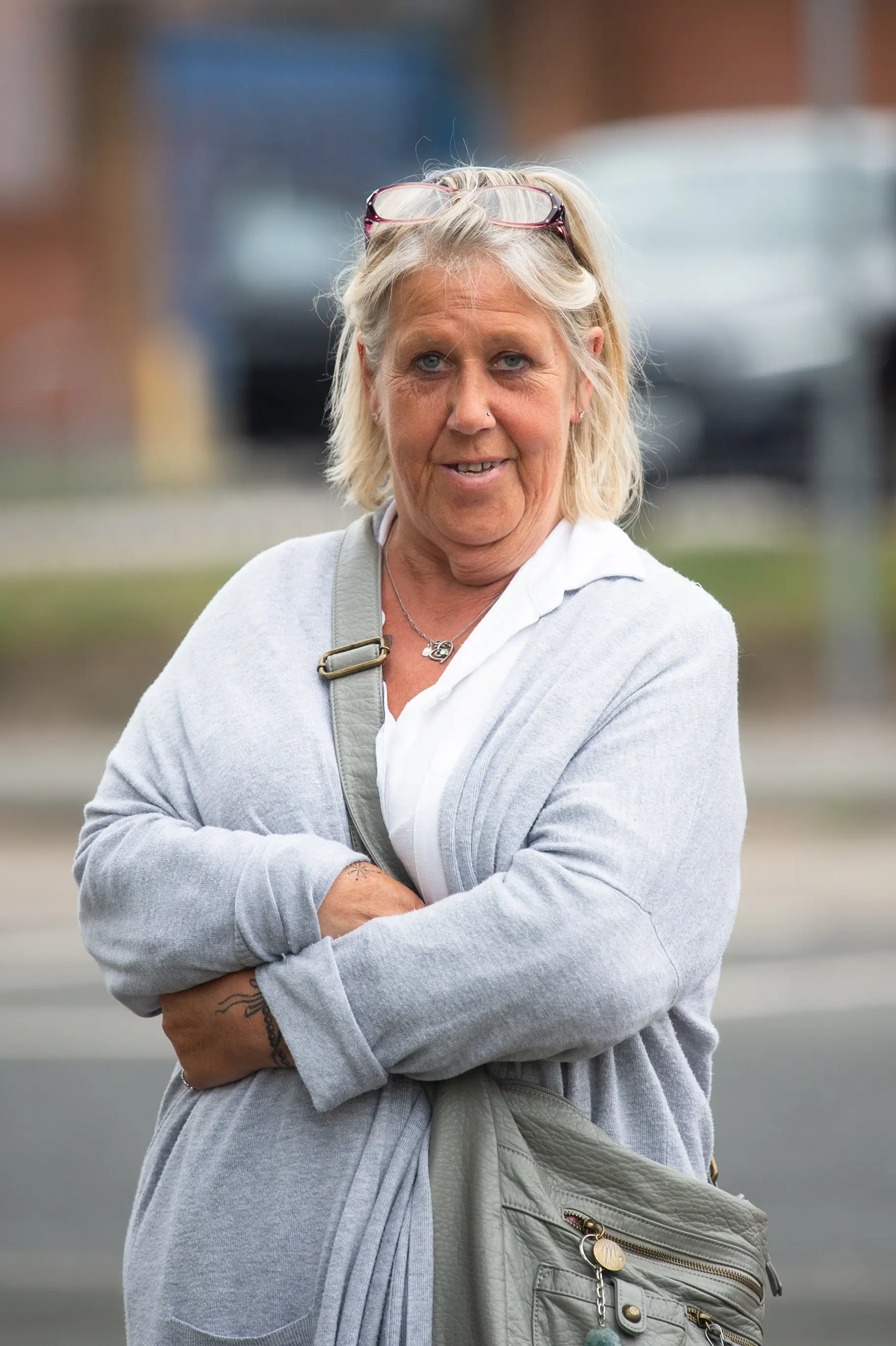 Pauline Randles pled guilty to criminal damage, harassment, and assault after punching her son.