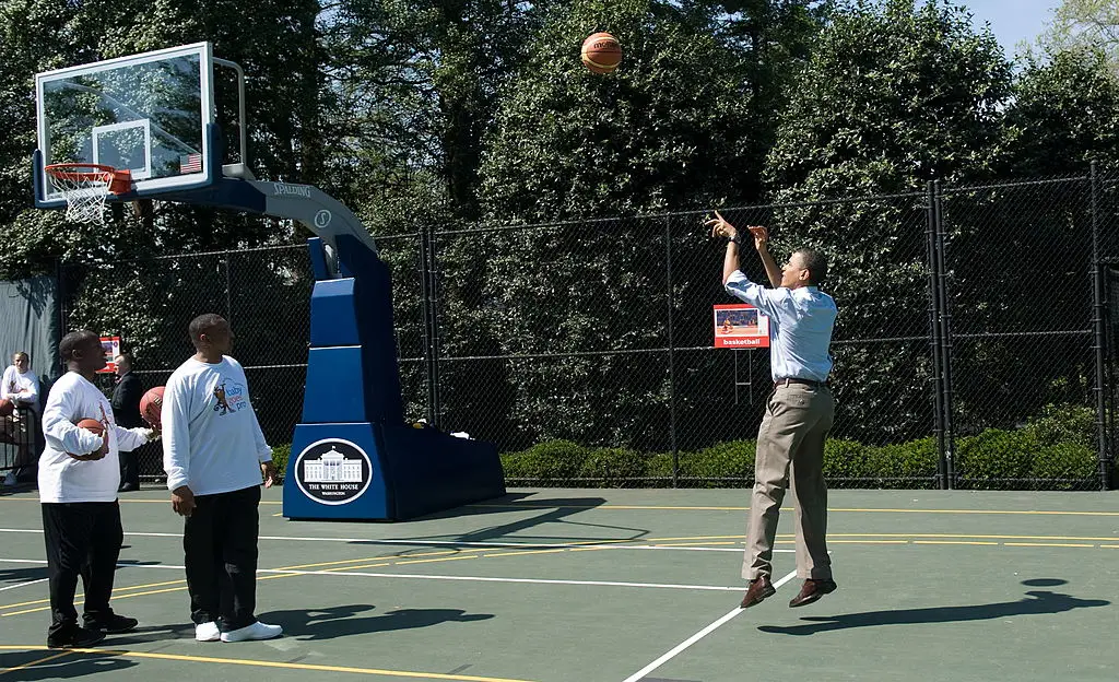 Obama transformed the White House tennis court into a basketball court so the space could serve both purposes (SAUL LOEB / Staff / Getty Images)
