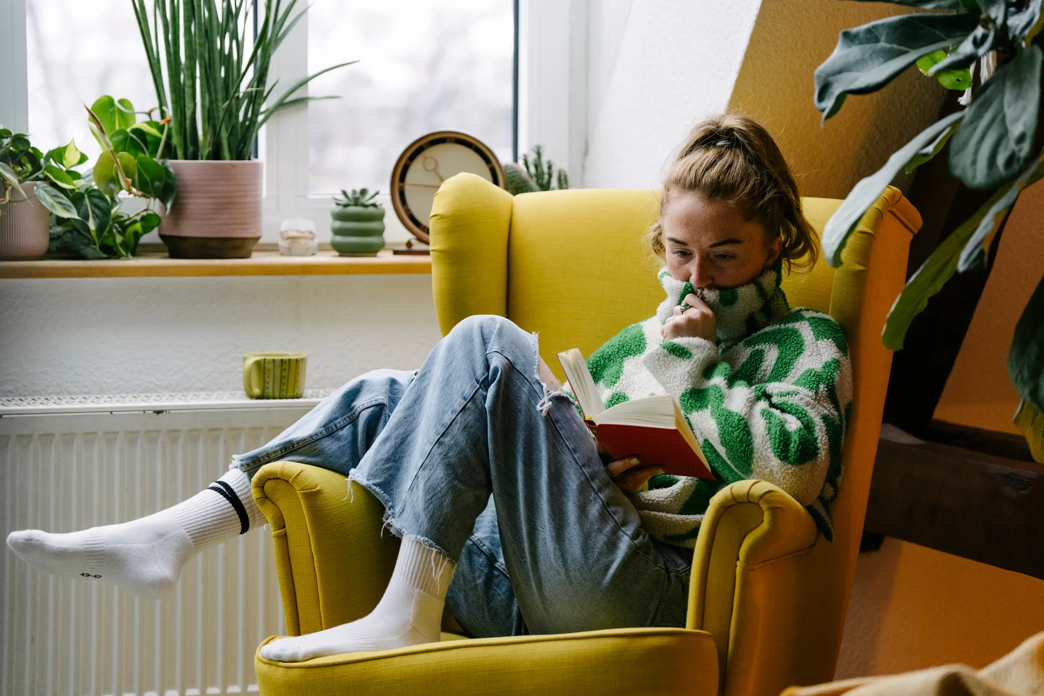 Reading your favourite books from your childhood is also an example of 'childhoodmaxxing' (Getty Stock Images)
