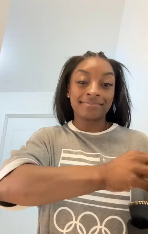 The gold medallist took to TikTok to open up about the cosmetic procedure. (TikTok/@simonebilesowens)