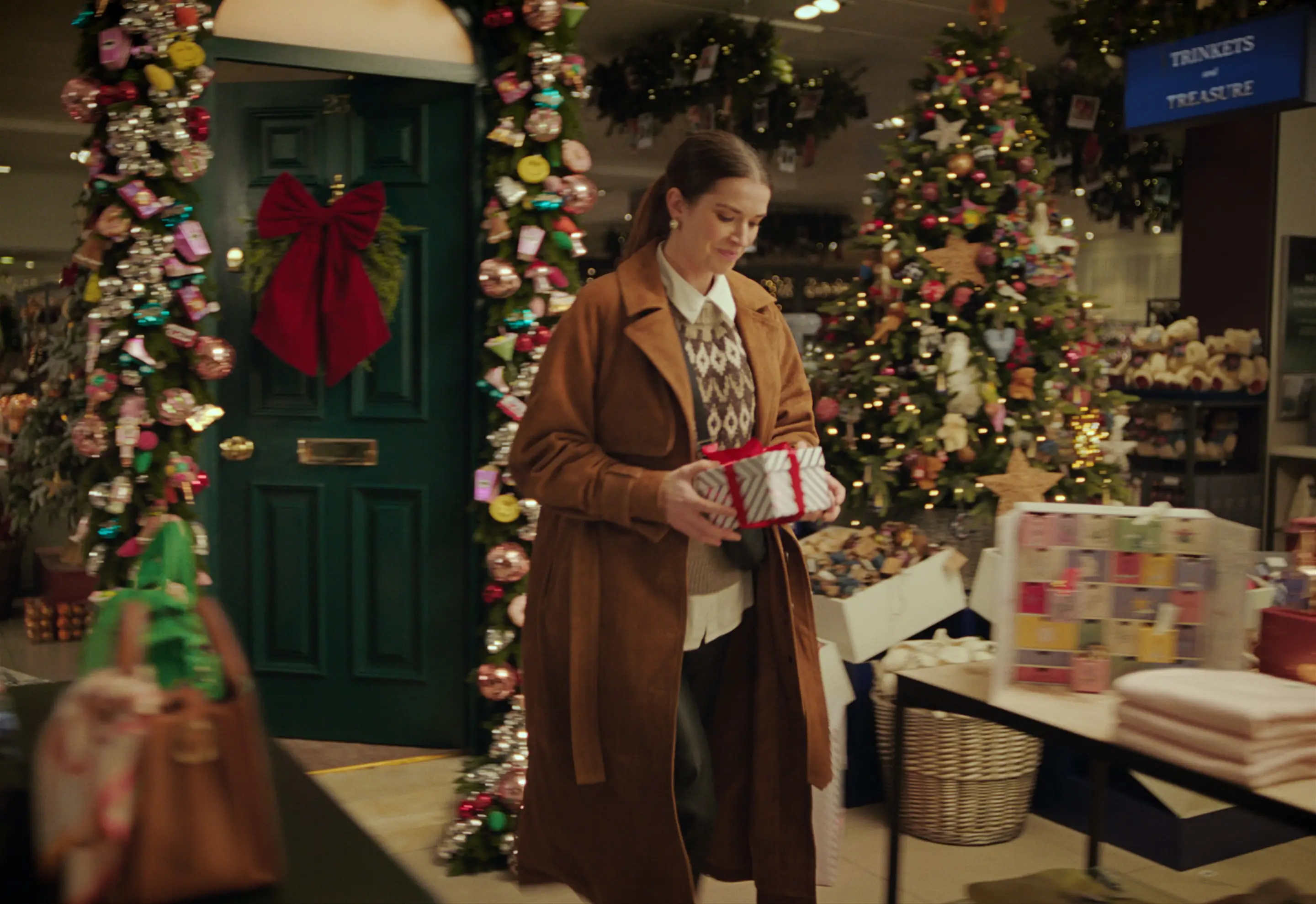 The ad follows a woman frantically searching for her sister's Christmas present (John Lewis)