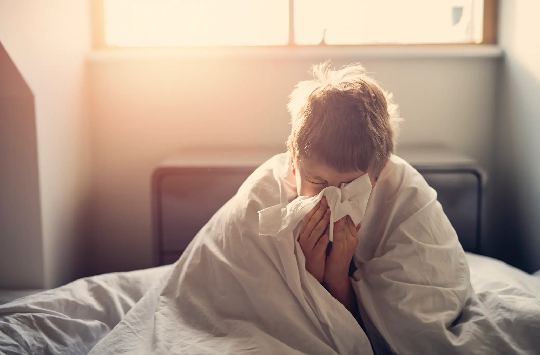 A school nurse has warned over one flu symptom that means your child should not go into school (Getty Stock Images)