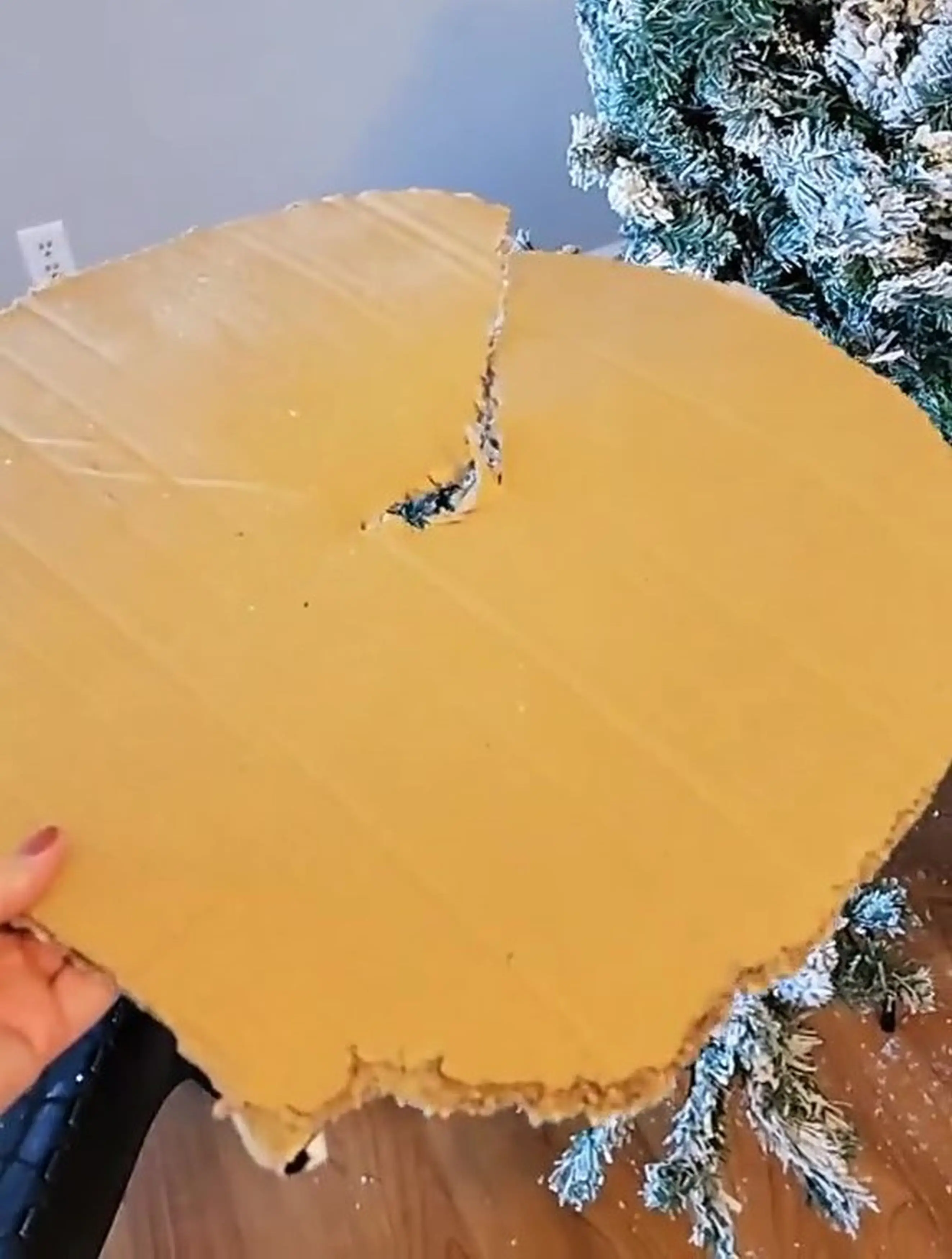 Just stick this in your tree and it should stop cats from clambering up it.