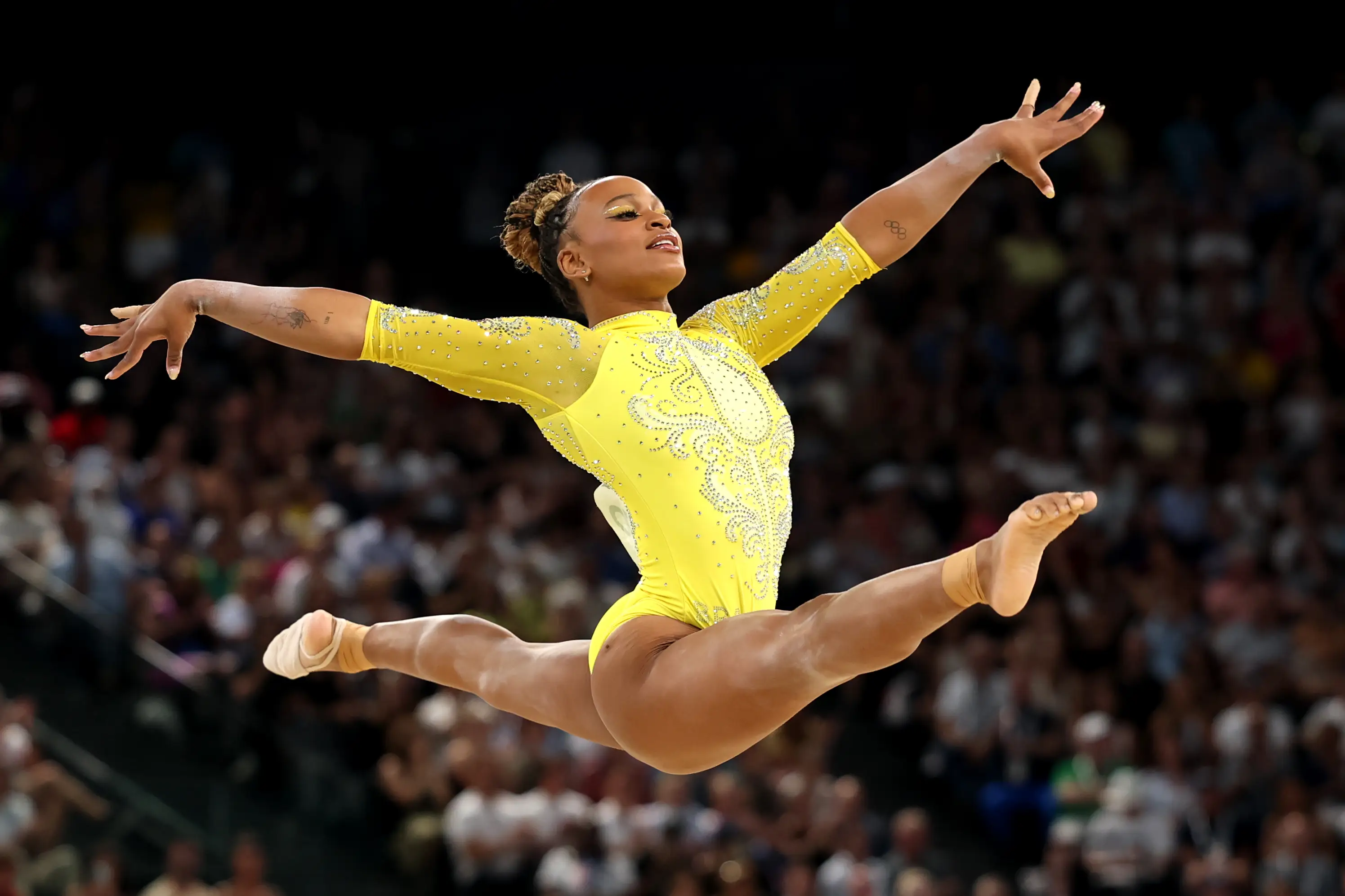Gymnasts must maintain their facial composure. (Jamie Squire/Getty Images)