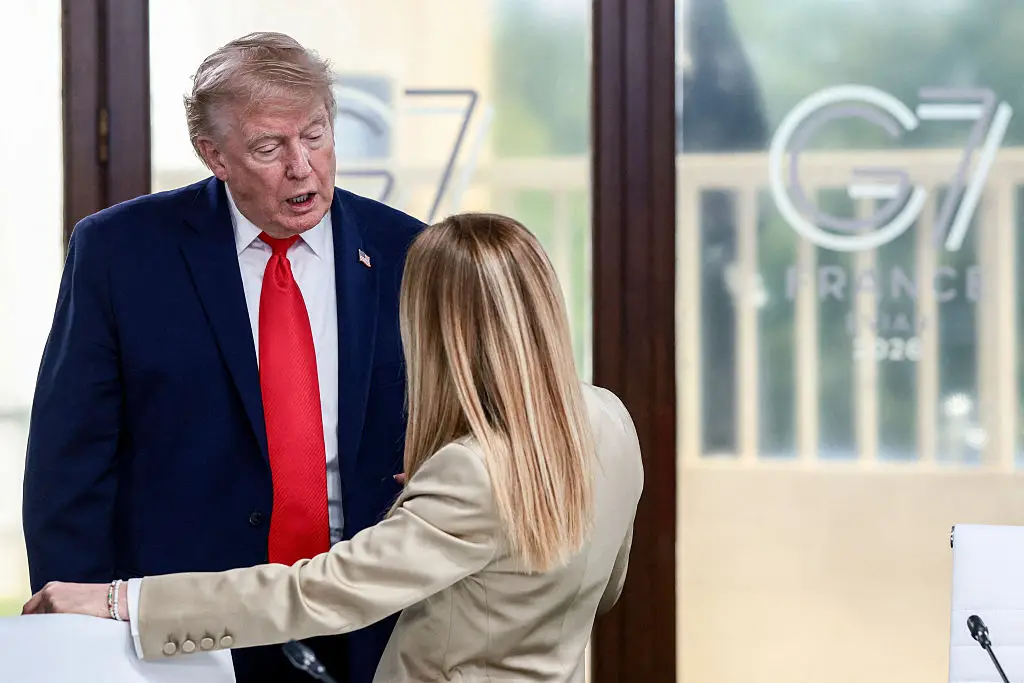 The Italian PM seemed to have some words for Trump after he arrived late (Evelyn Hockstein / POOL / AFP via Getty Images)