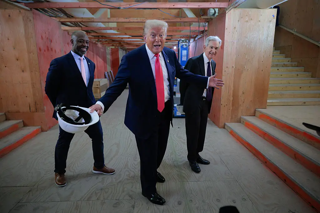 Trump toured the Federal Reserve amid the ongoing renovations on Thursday ( Chip Somodevilla / Getty Images)