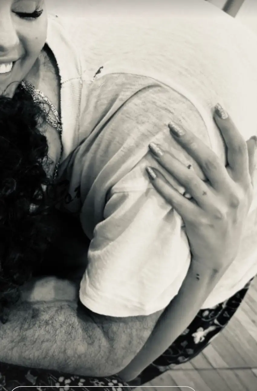 She went on to share a snap of the duo cuddling.