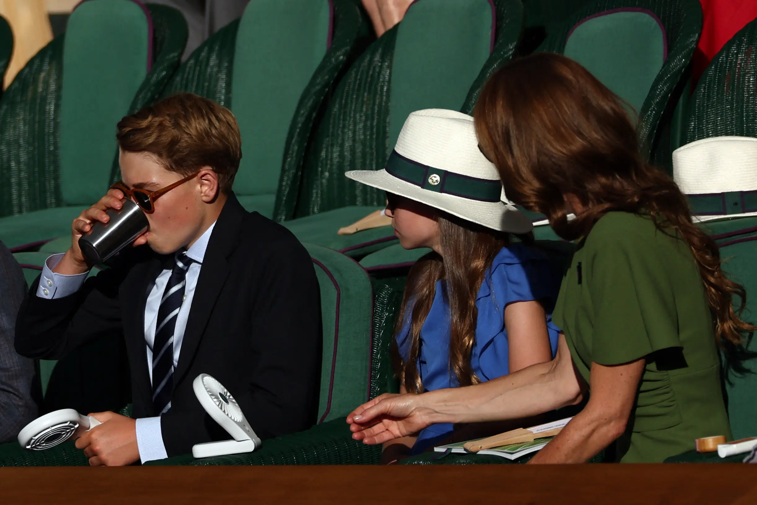 George wore high suit and tie buttoned-up all day (Adrian Dennis / AFP via Getty Images)