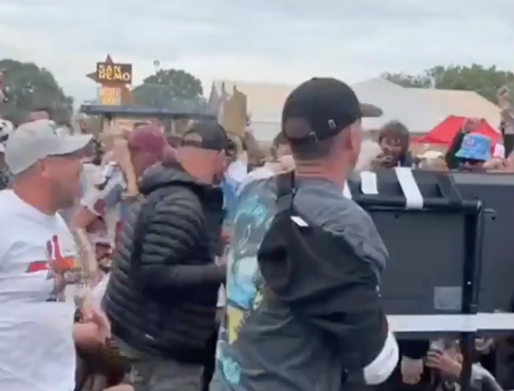 Someone had wheeled a TV in so people could watch the game. (BBC)