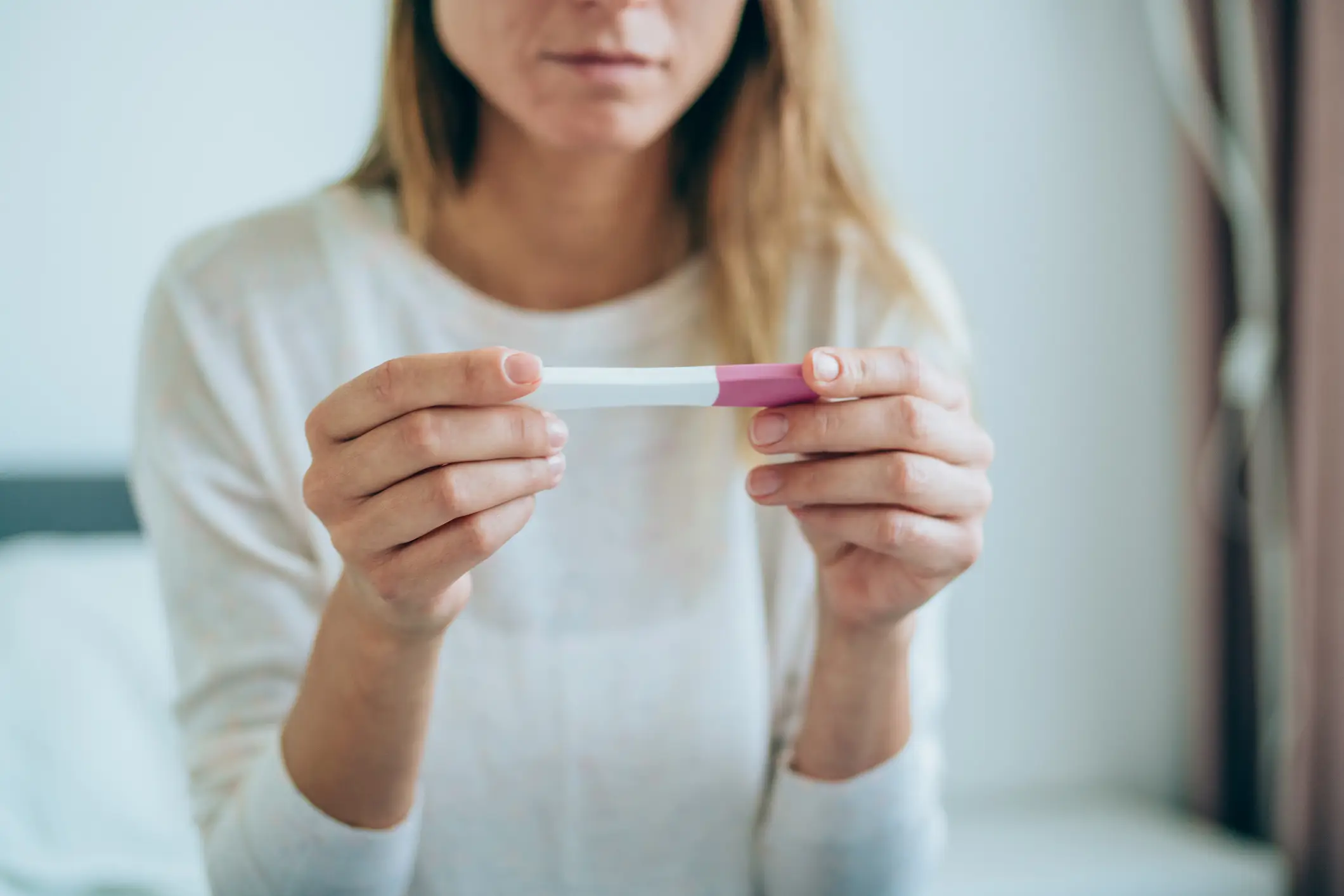 A woman's pregnancy announcement was 'ruined' after a family friend sent a brutal text. (Getty Stock Image)