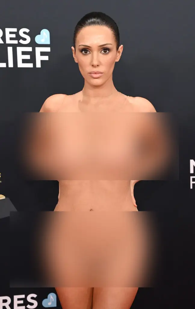 Bianca Censori wore a see-through mesh dress at the Grammys on Sunday, causing controversy worldwide (Jon Kopaloff / Stringer / Getty Images)