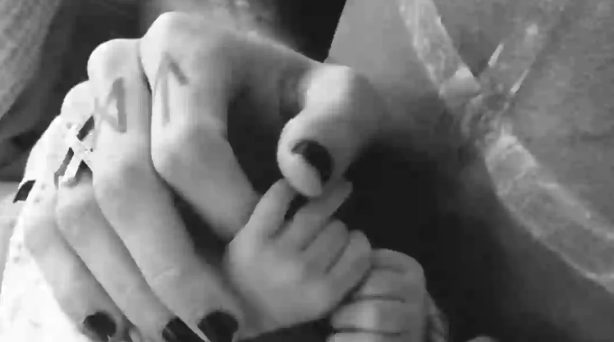 MGK shared a sweet video holding his new daughter's hand (Instagram/@machinegunkelly)