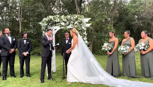 Cara and Matt's wedding was crashed by a little kitten.