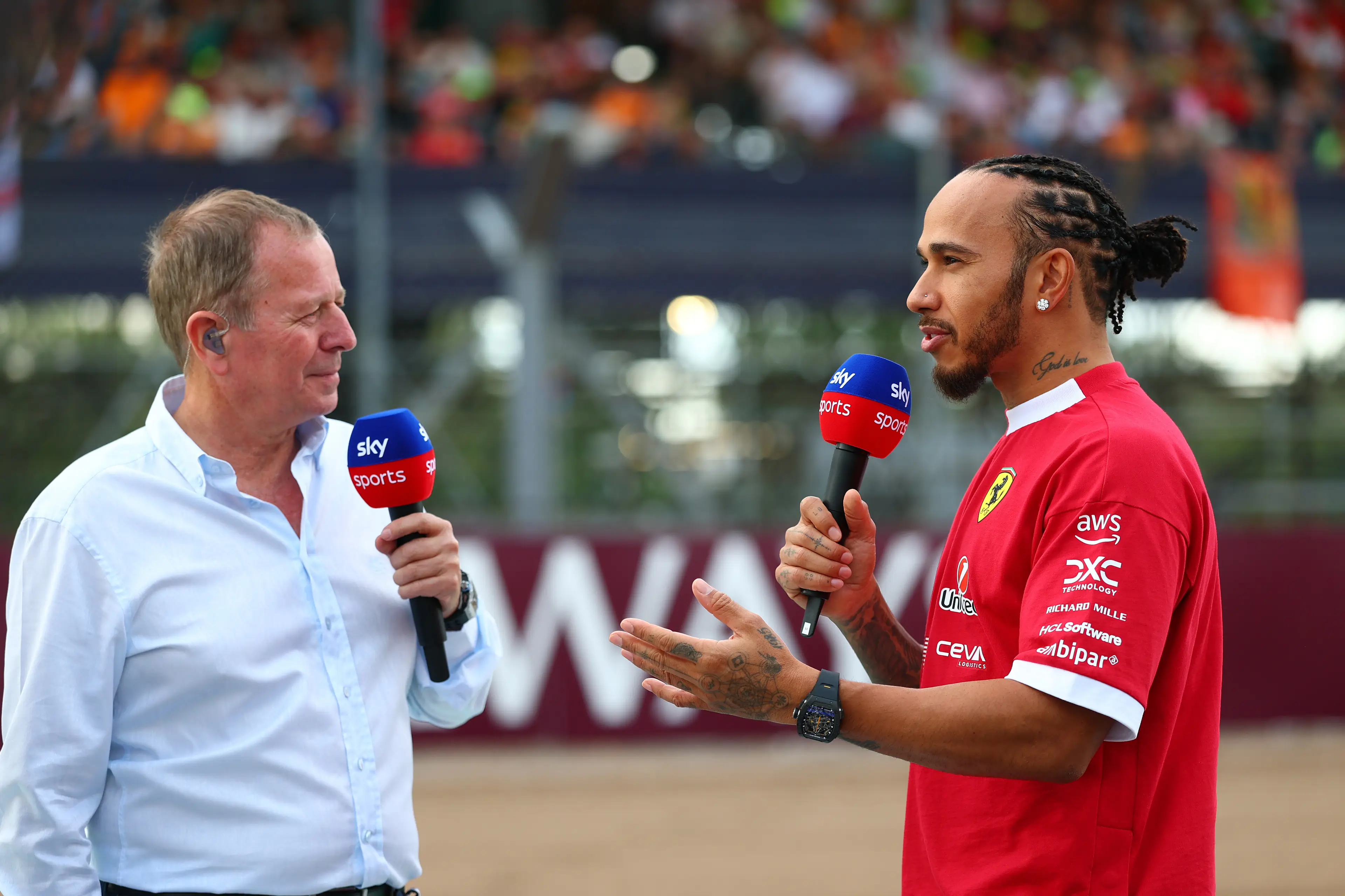 Martin Brundle with Lewis Hamilton (Bryn Lennon - Formula 1/Formula 1 via Getty Images)