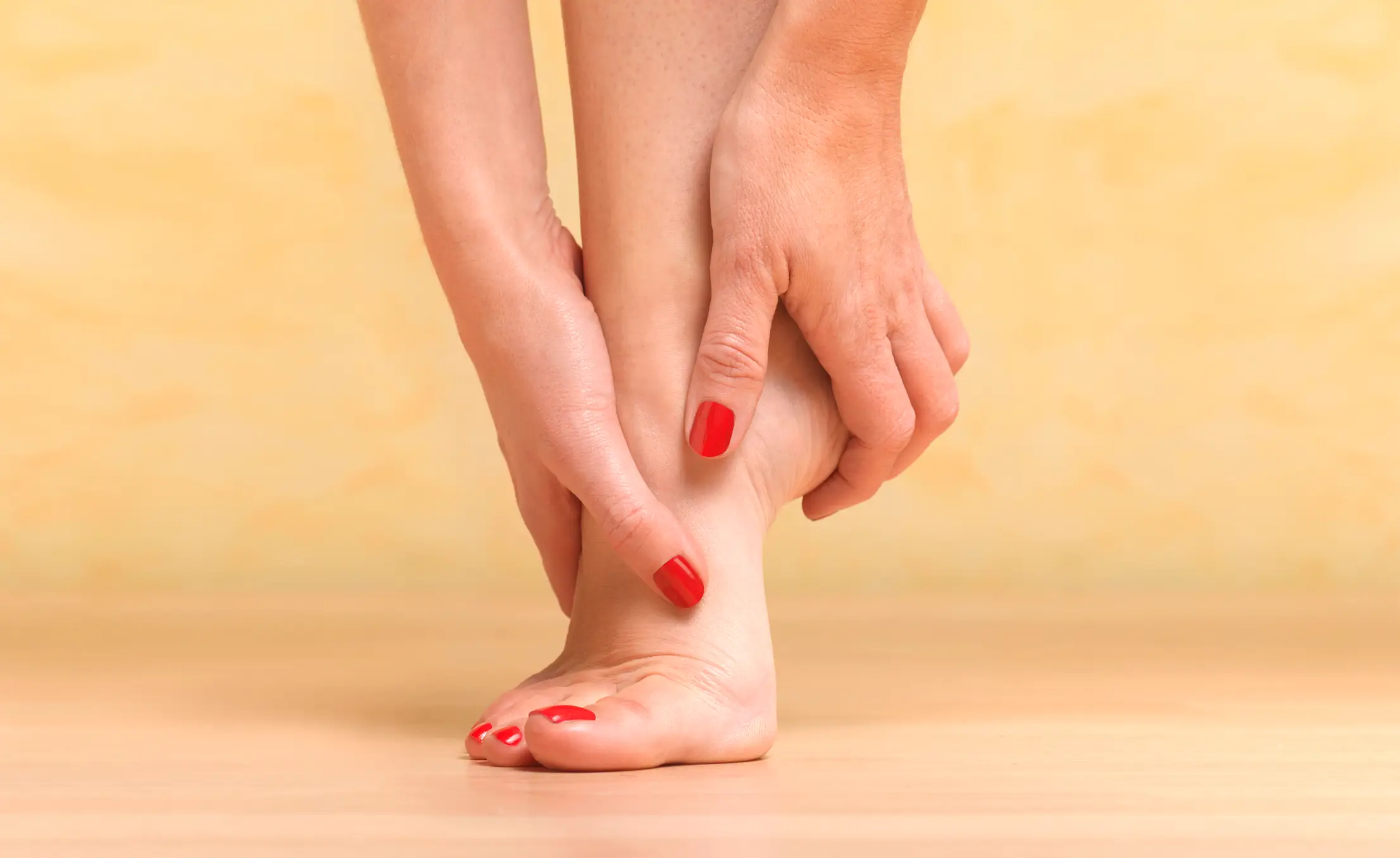 Swollen feet and ankles could also be a sign of liver damage (Peter Dazeley / Getty Images)