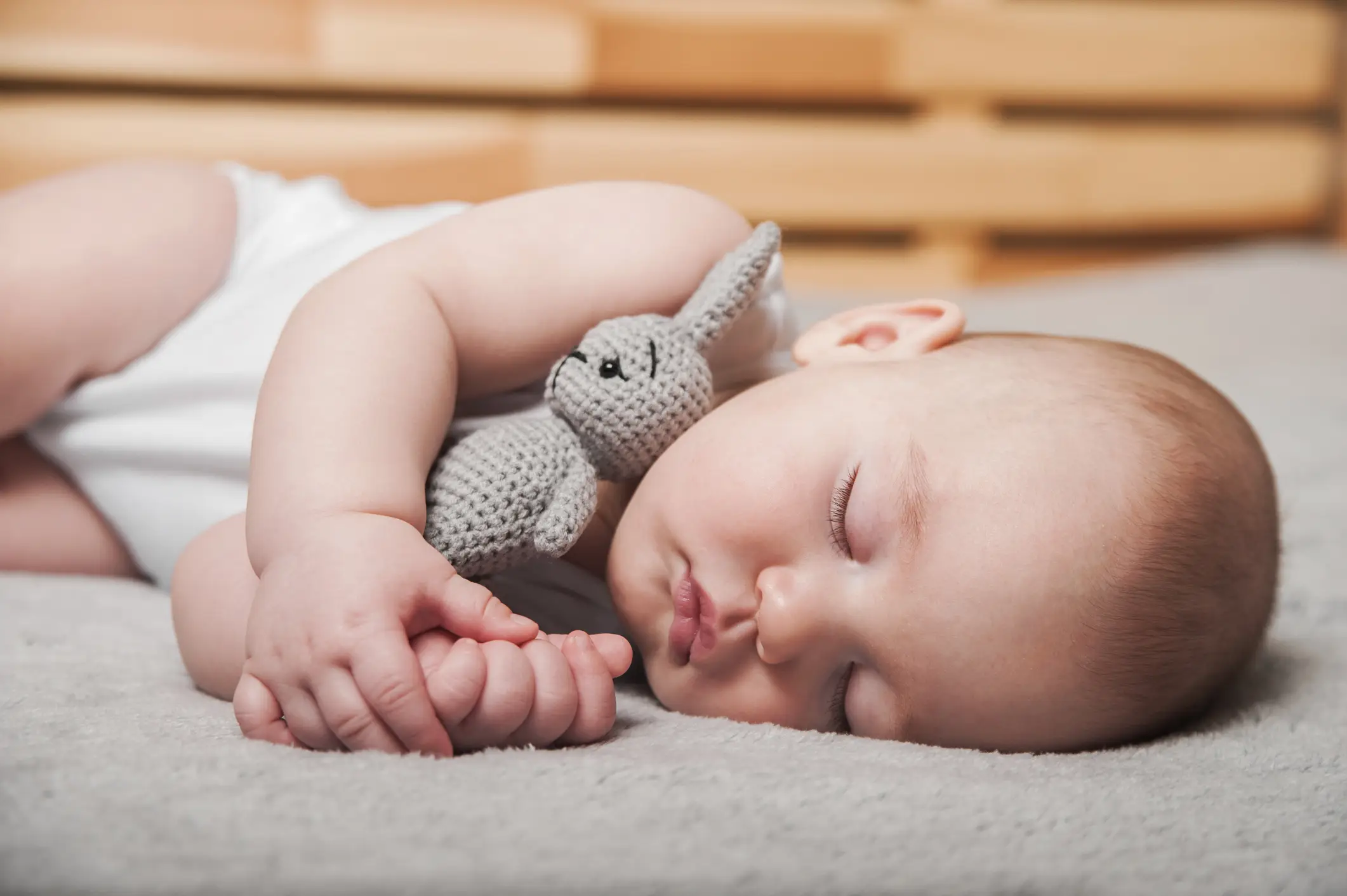 A midwife has warned against parents letting their babies sleep in just a nappy during the heatwave (Getty Stock Images)