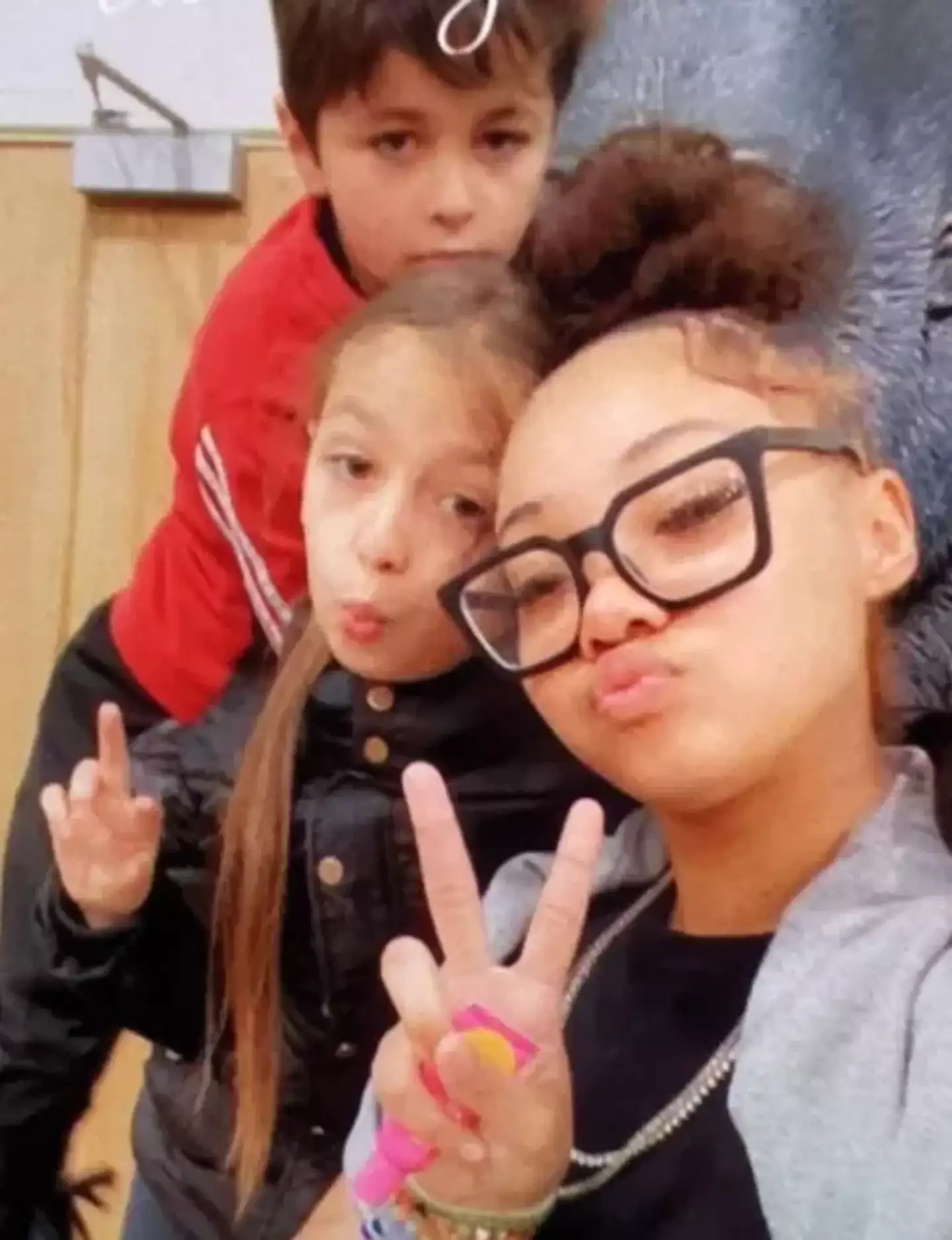 Malik, seven, Amelia, nine, and Khandi, 14. (Surrey Police)