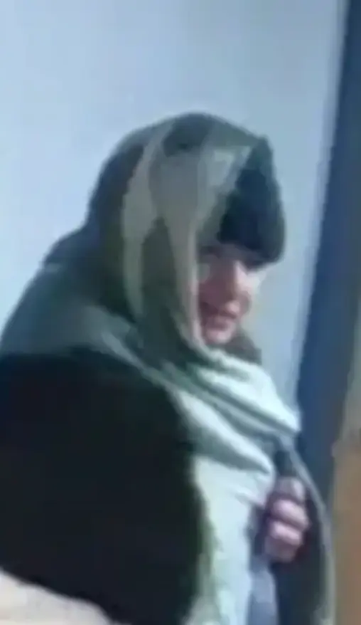 The footage shows Owens arrive at the halls in Preston wrapped in a blanket (Lancashire Constabulary)