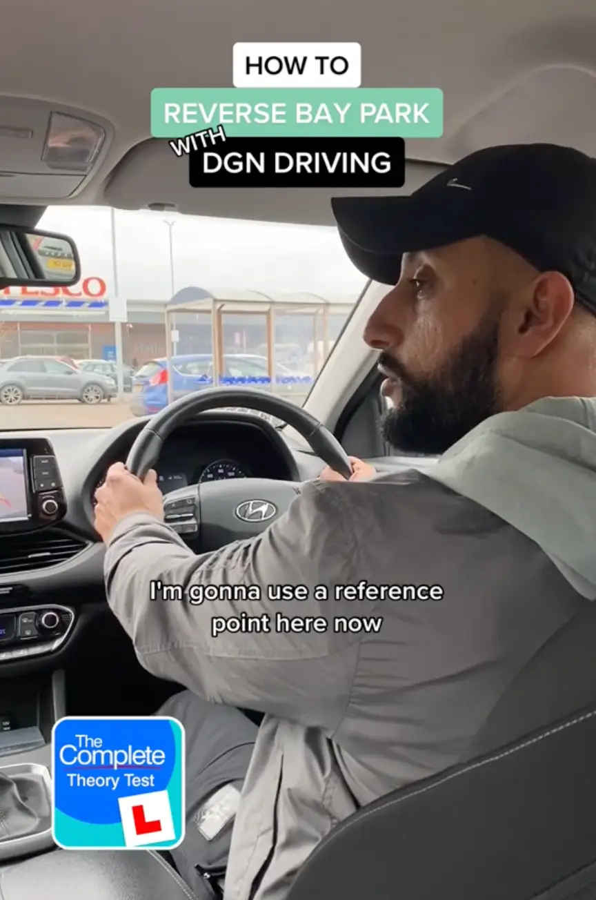 The driving instructor gave a step-by-step tutorial on how to reverse bay park.