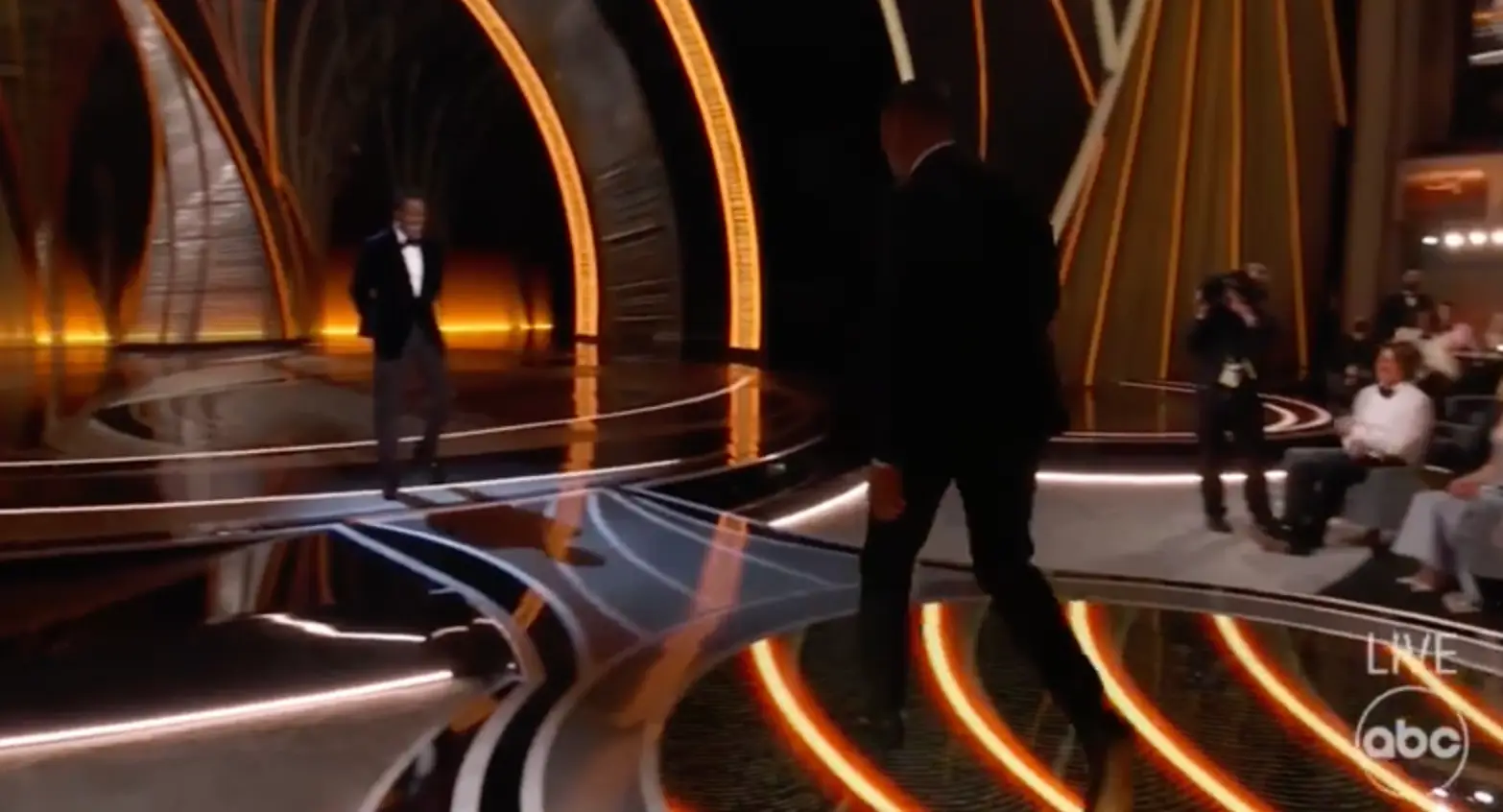 Will approached Chris on stage (