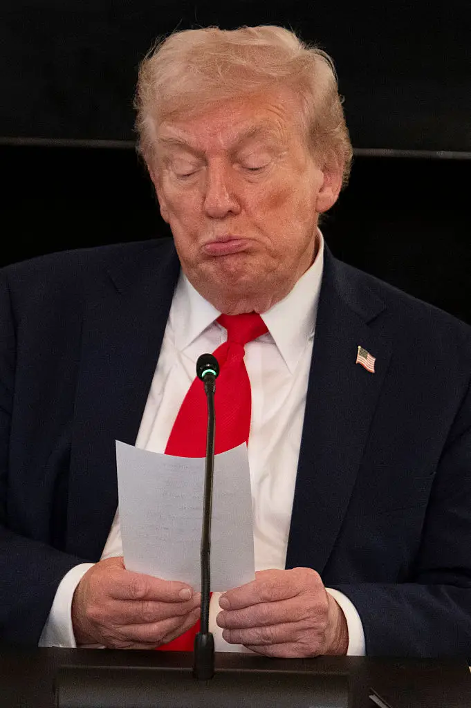 The note has prompted questions over whether Trump writes his own Truth Social posts (JIM WATSON/Getty Images)