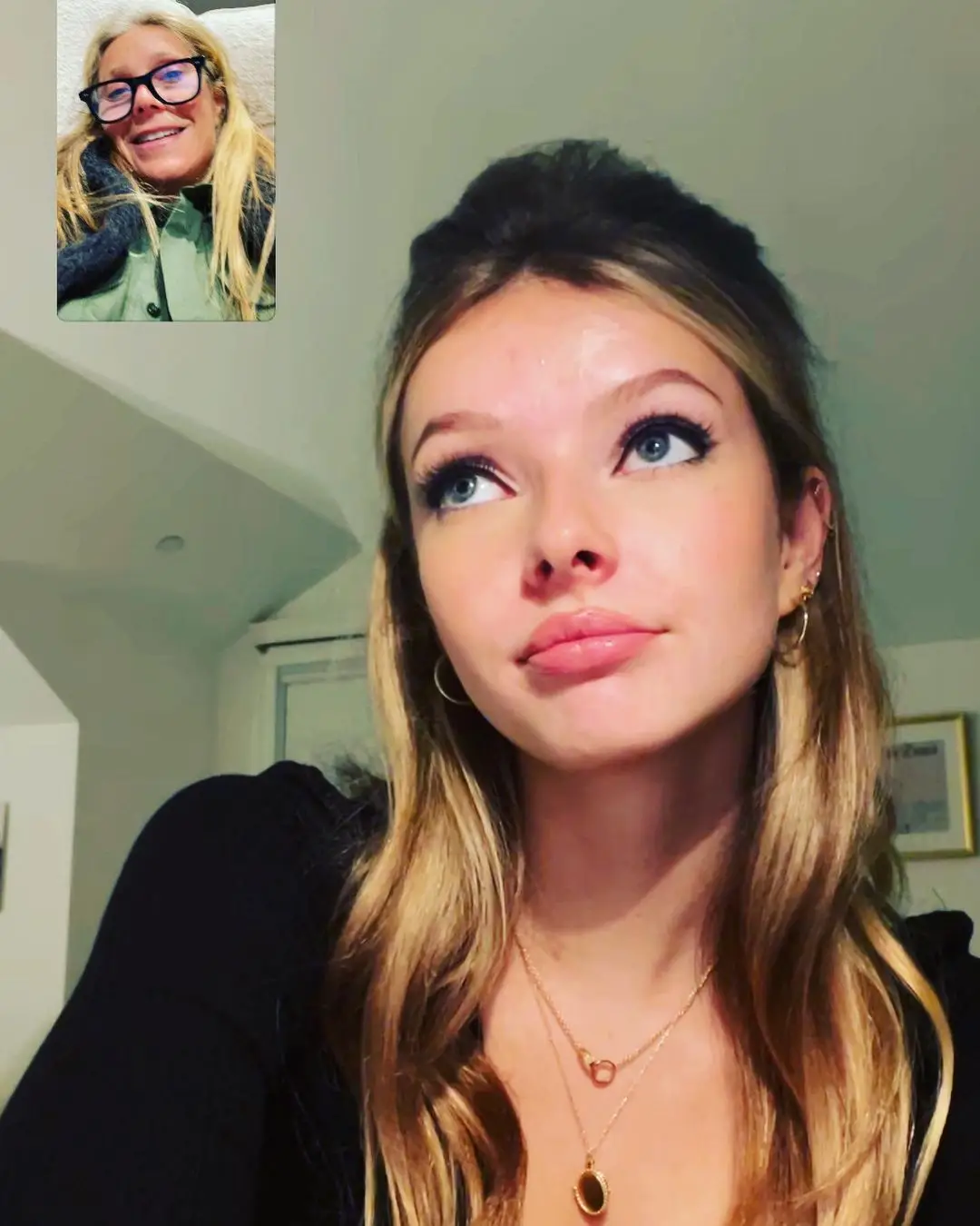 Gwyneth video calling her daughter Apple.