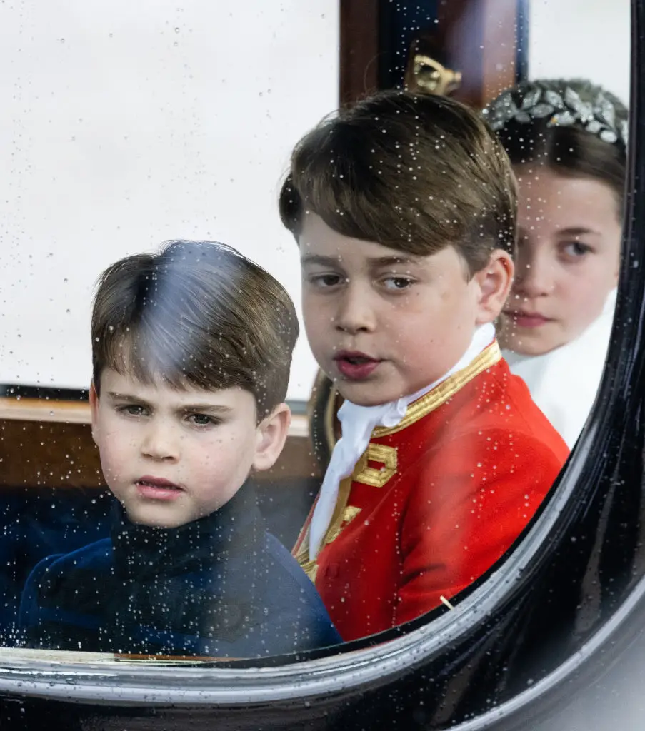 George pictured with his siblings, Princess Charlotte and Prince Louis, at their grandad's coronation. (Samir Hussein/WireImage)