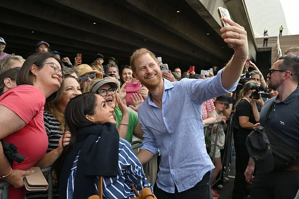 Harry and Meghan met fans at the Sydney Opera House on the final day of their Australia tour (SAEED KHAN/Getty Images)