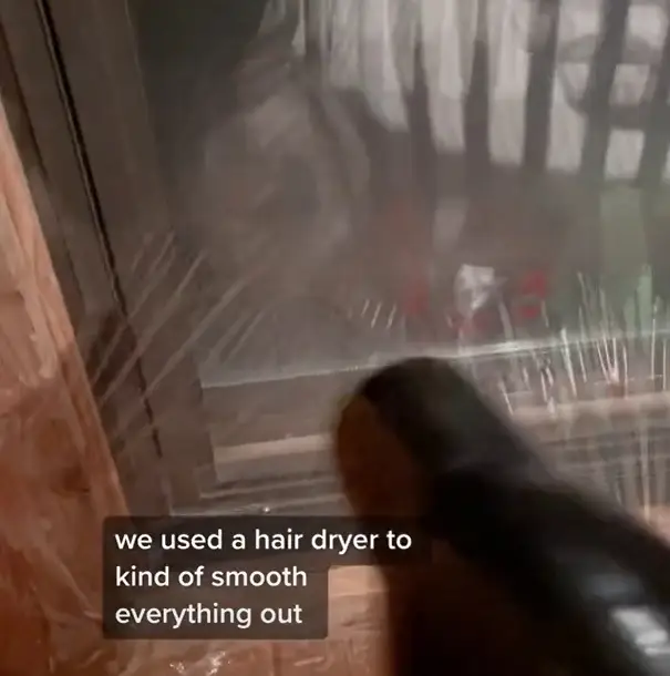 Clever use of a hairdryer is crucial to iron out the wrinkles and seal the windows.