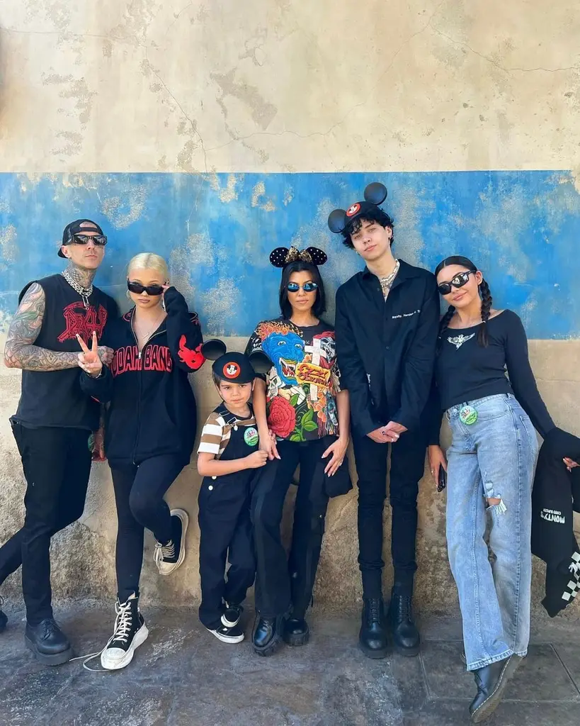 When he was little Mason happily appeared in family photos, but now it's a rarer sight (instagram/@kourtneykasdash)