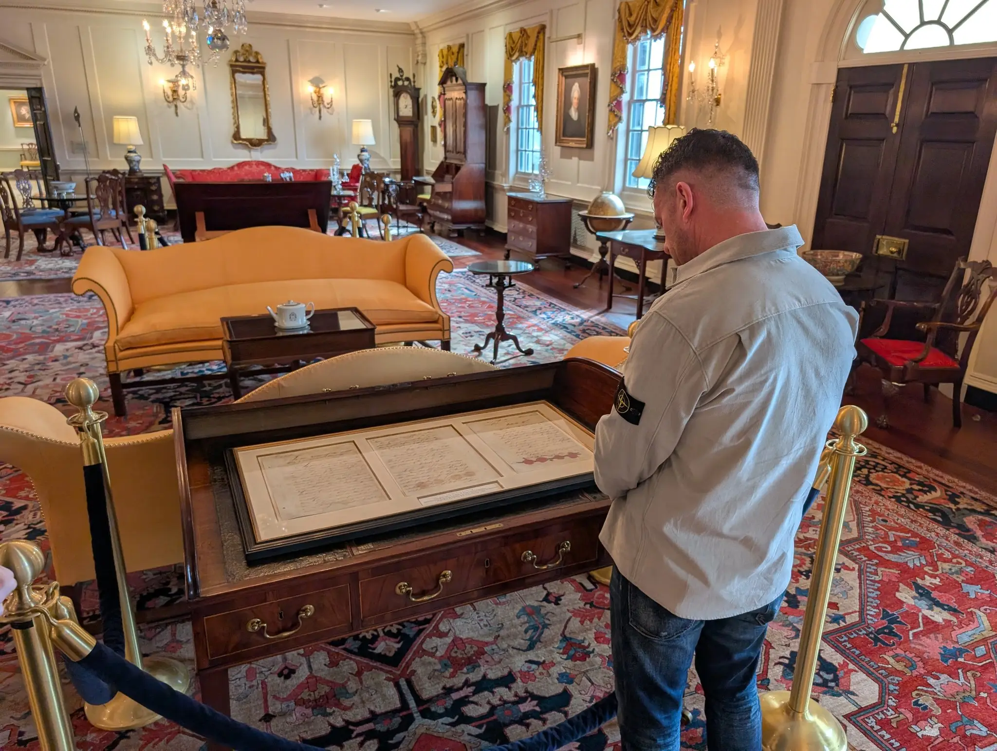One photo posted to social media showed Robinson looking at artefacts in a diplomatic reception room (X/Joe Rittenhouse)