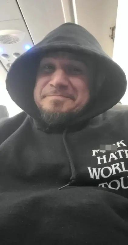 One man was removed from a flight for wearing an 'offensive' hoodie (Facebook/John Garcia Jr [JJ])