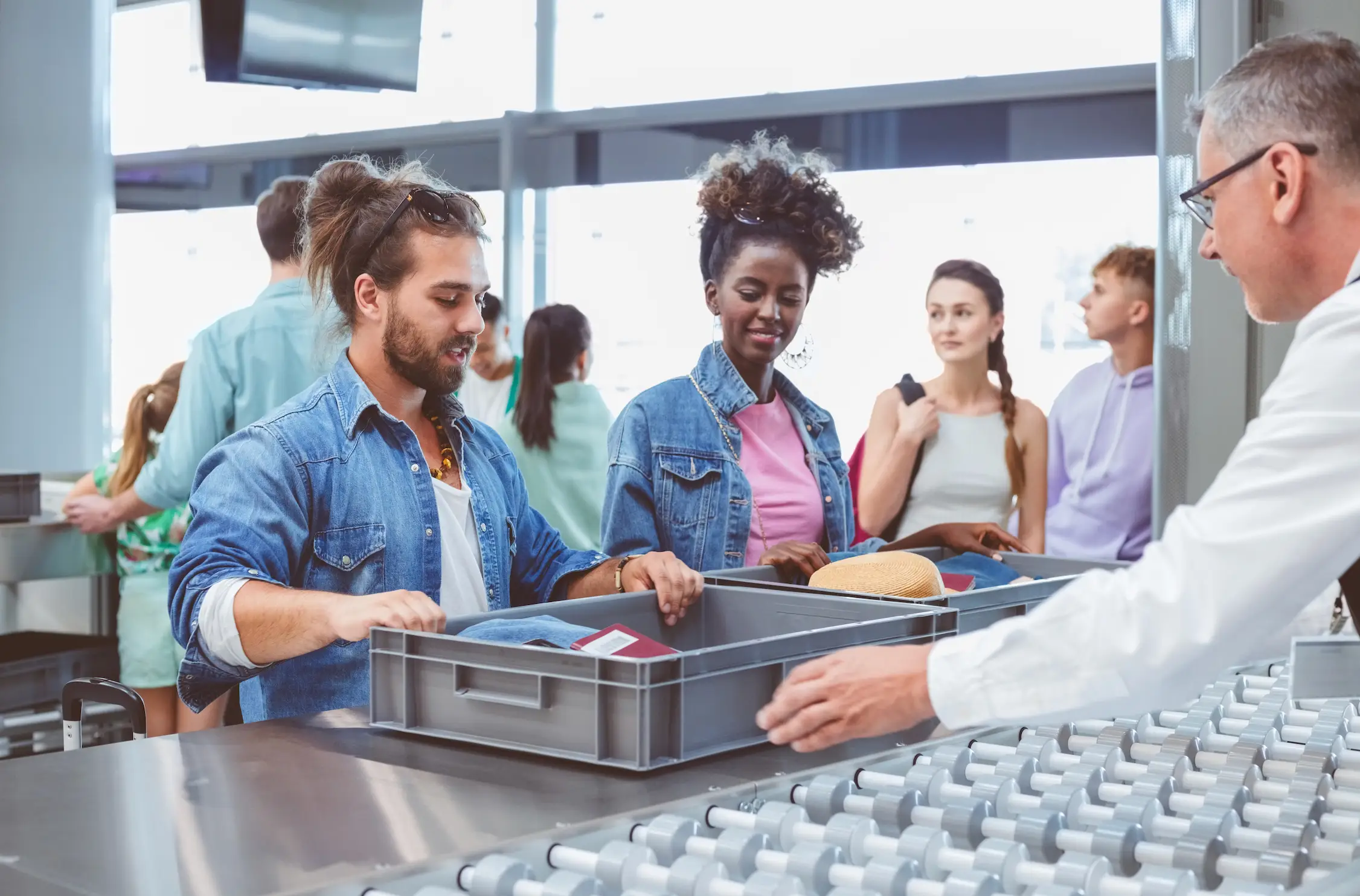 Passengers will now separate their electronics and liquids. (izusek/Getty)