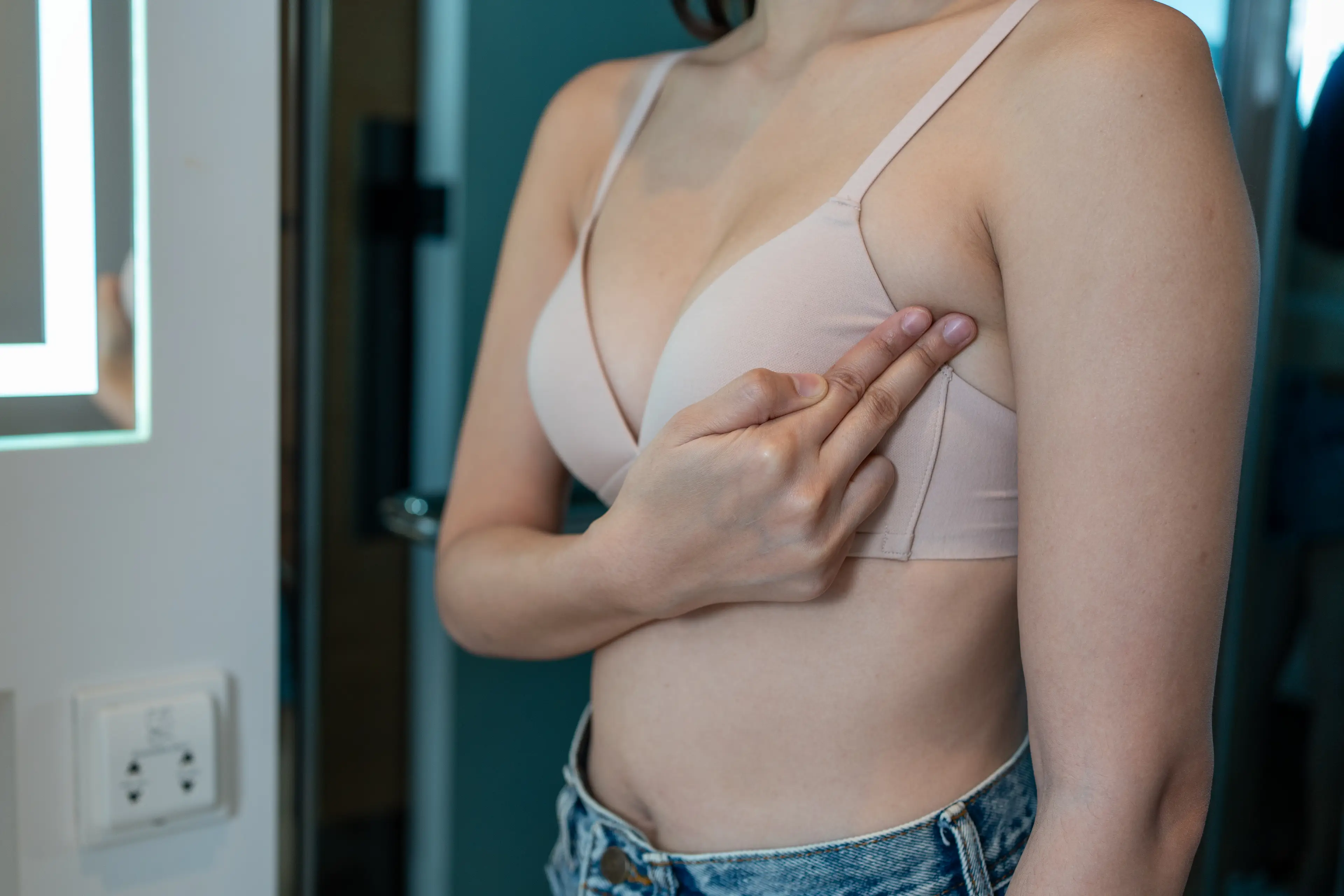 The NHS recommends regularly checking your breasts (Getty Stock Images)