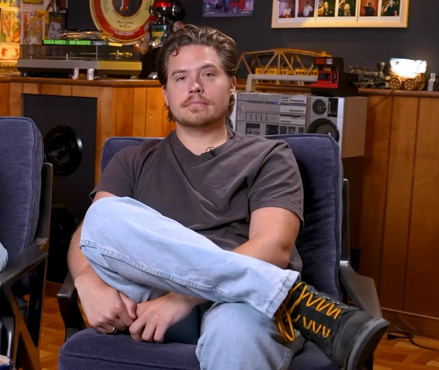 Sprouse jokingly compared his early acting career to 'child labour' (YouTube/Wildmen Podcast)