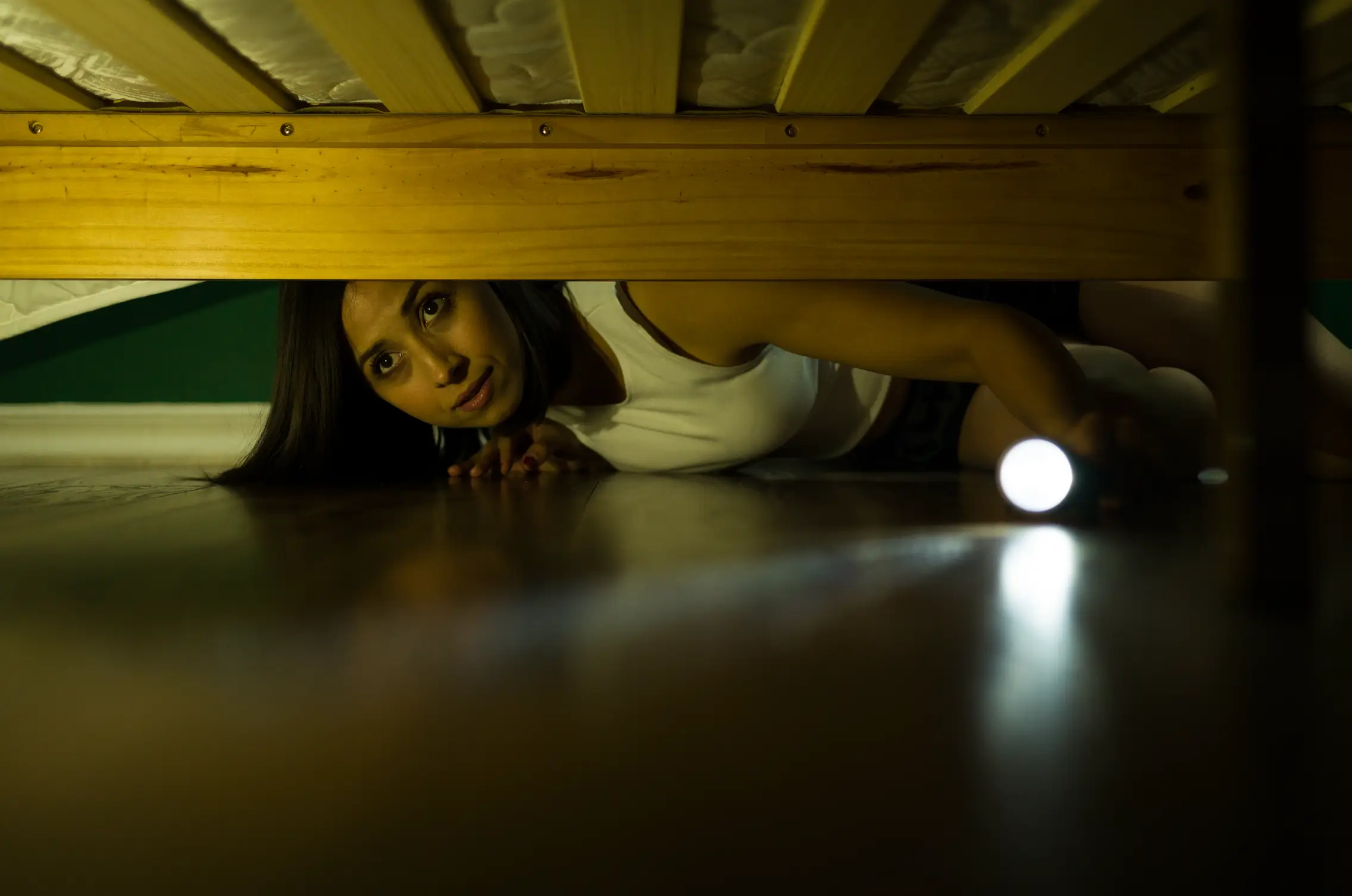 The babysitter checked out the 'monster' under the bed (Antonio_Diaz/Getty Stock Images)