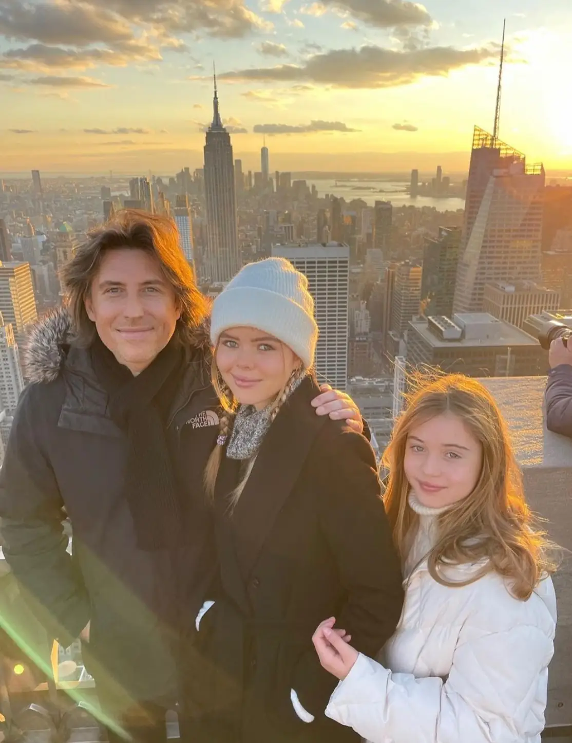 Chris with their daughters Alexa and Hollie.