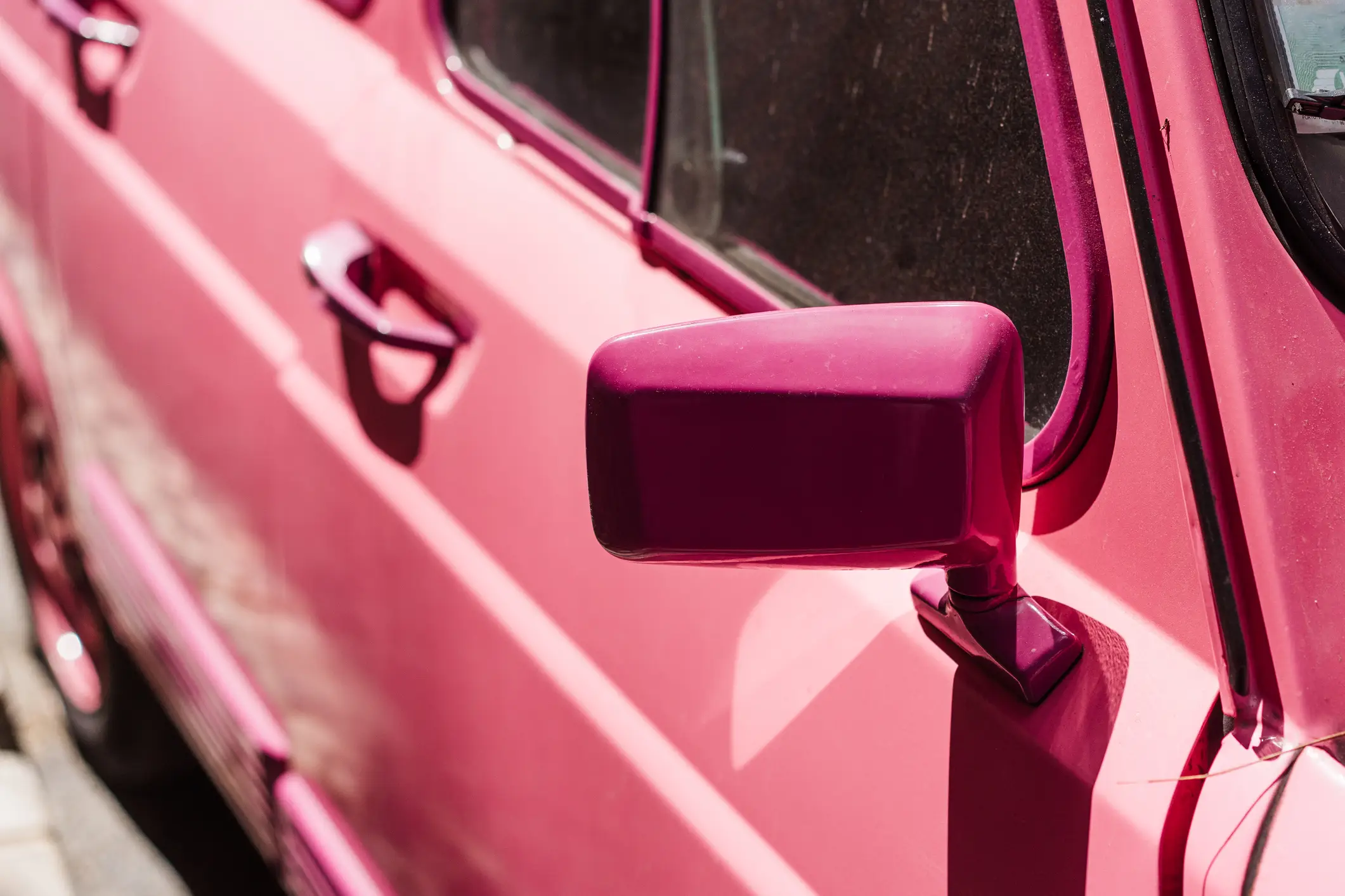 Women are sharing their negative experiences of driving pink cars (Getty Stock Image)
