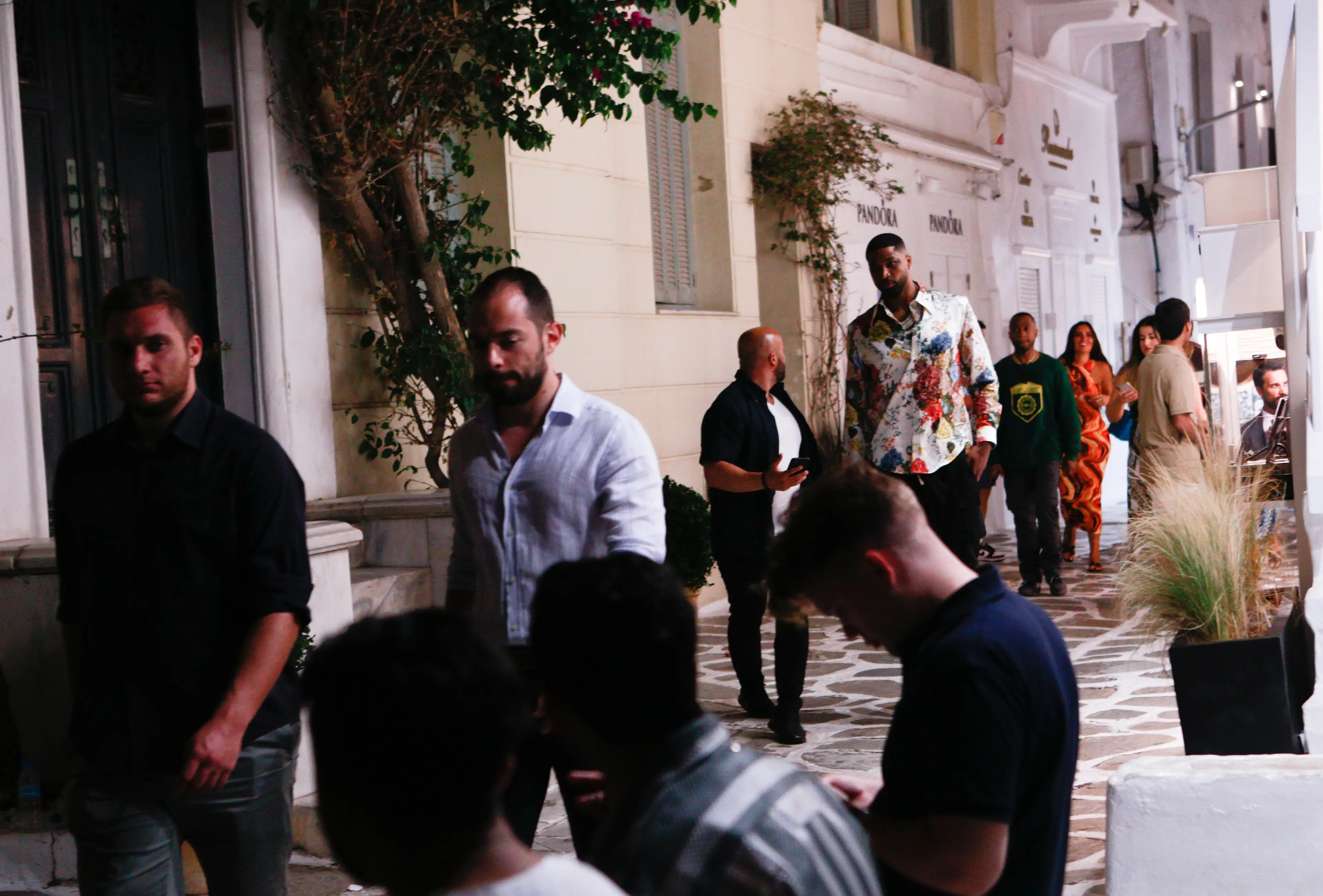 Tristan Thompson has been spotted partying in Greece ahead of the birth of his baby with Khloé Kardashian.