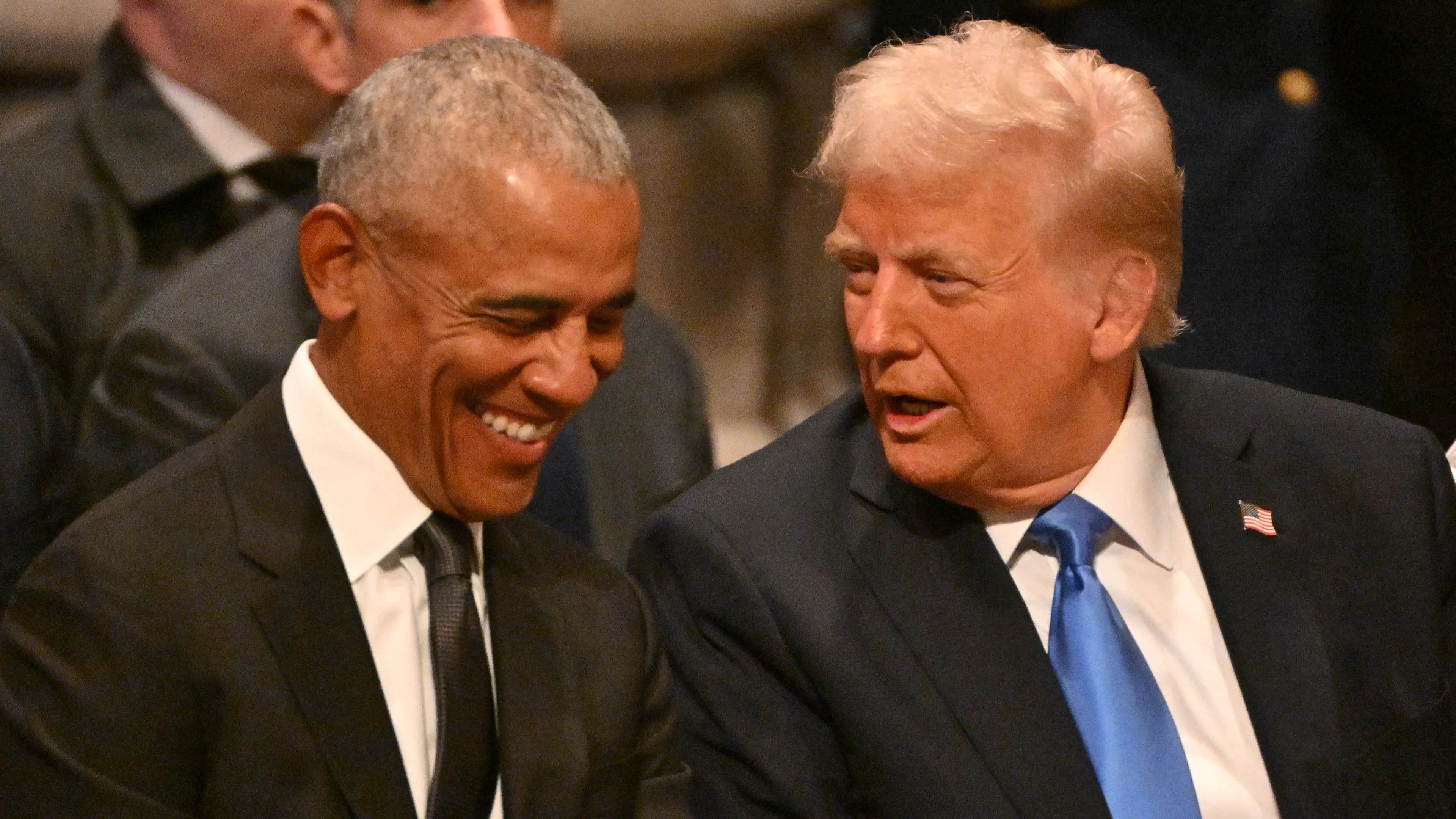 What Donald Trump and Barack Obama were really laughing about at Jimmy Carter’s funeral has finally been revealed