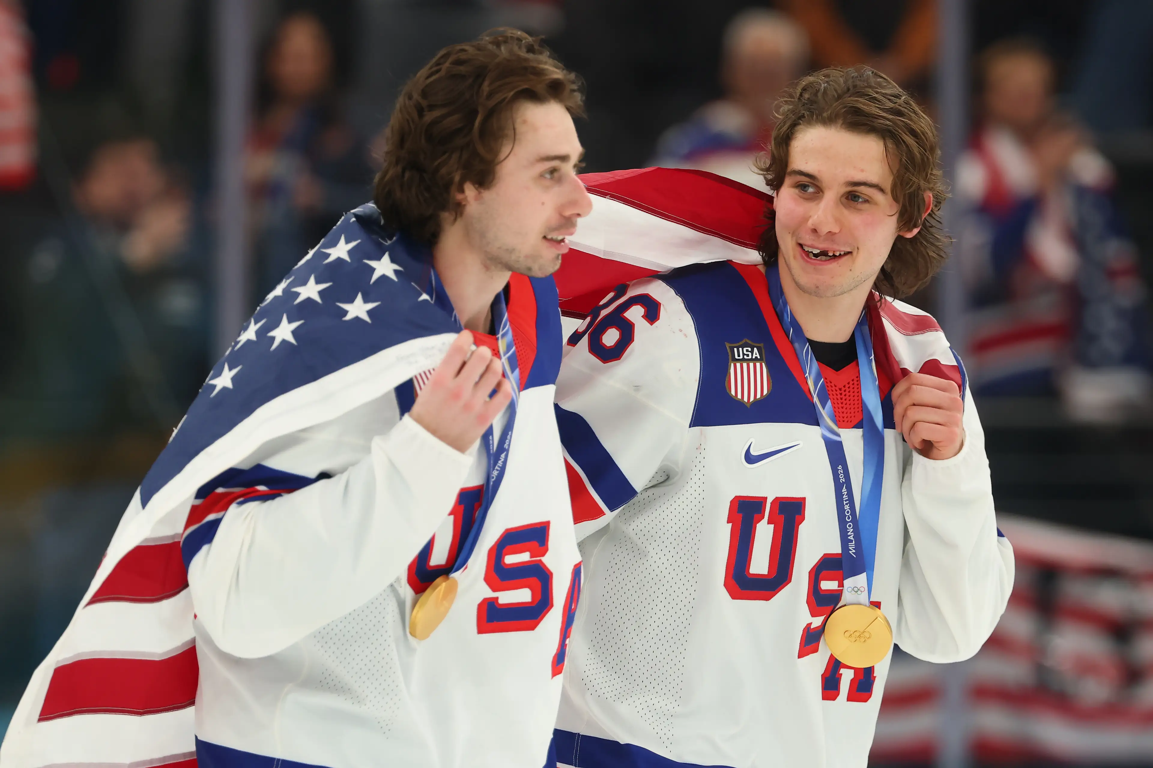 Quinn and Jack Hughes, and the Team USA men's hockey team have been called out for their reactions to Donald Trump's joke (Gregory Shamus/Getty Images)