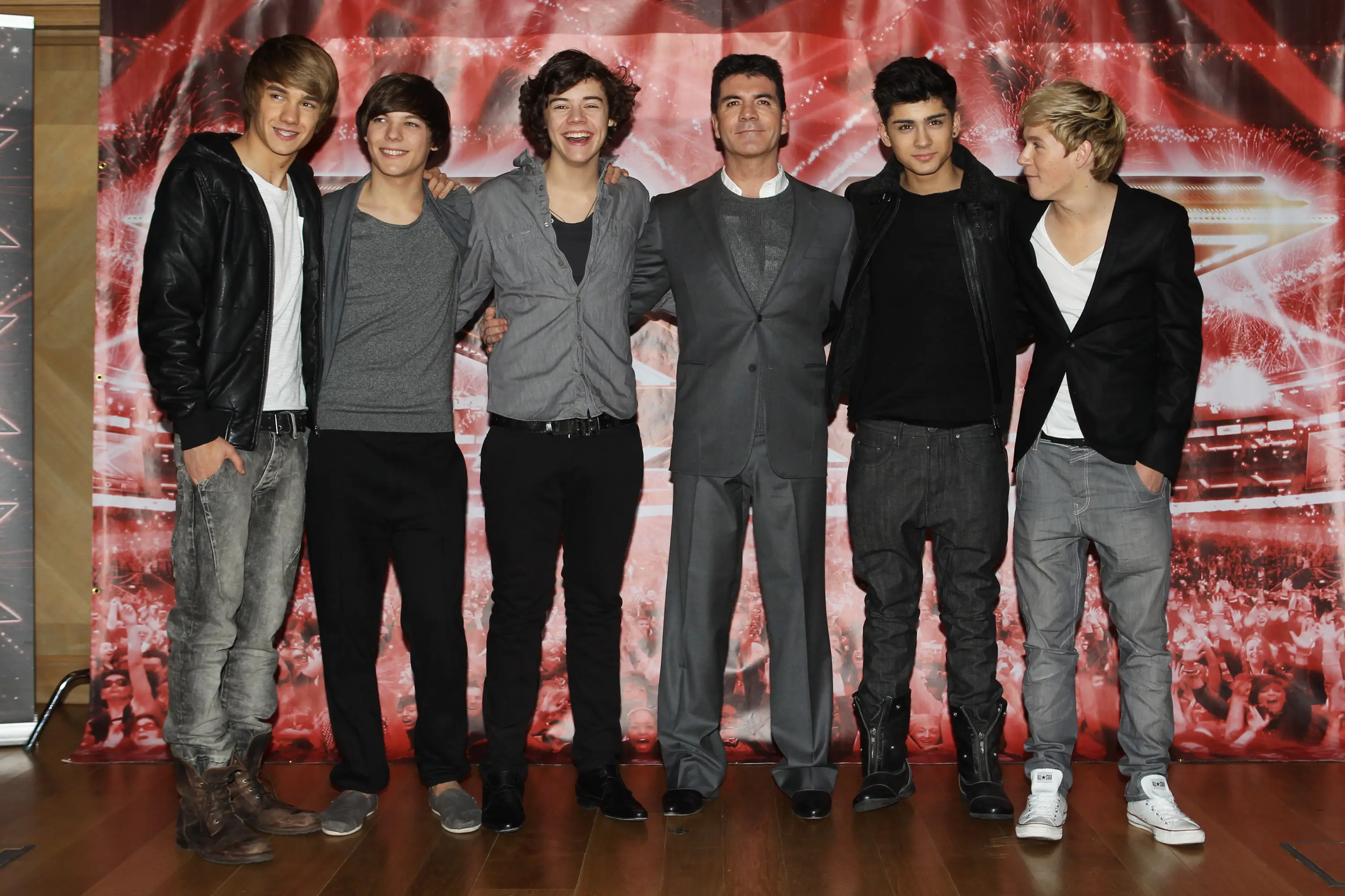 Simon Cowell with One Direction in 2010 (Dave Hogan/Getty Images)