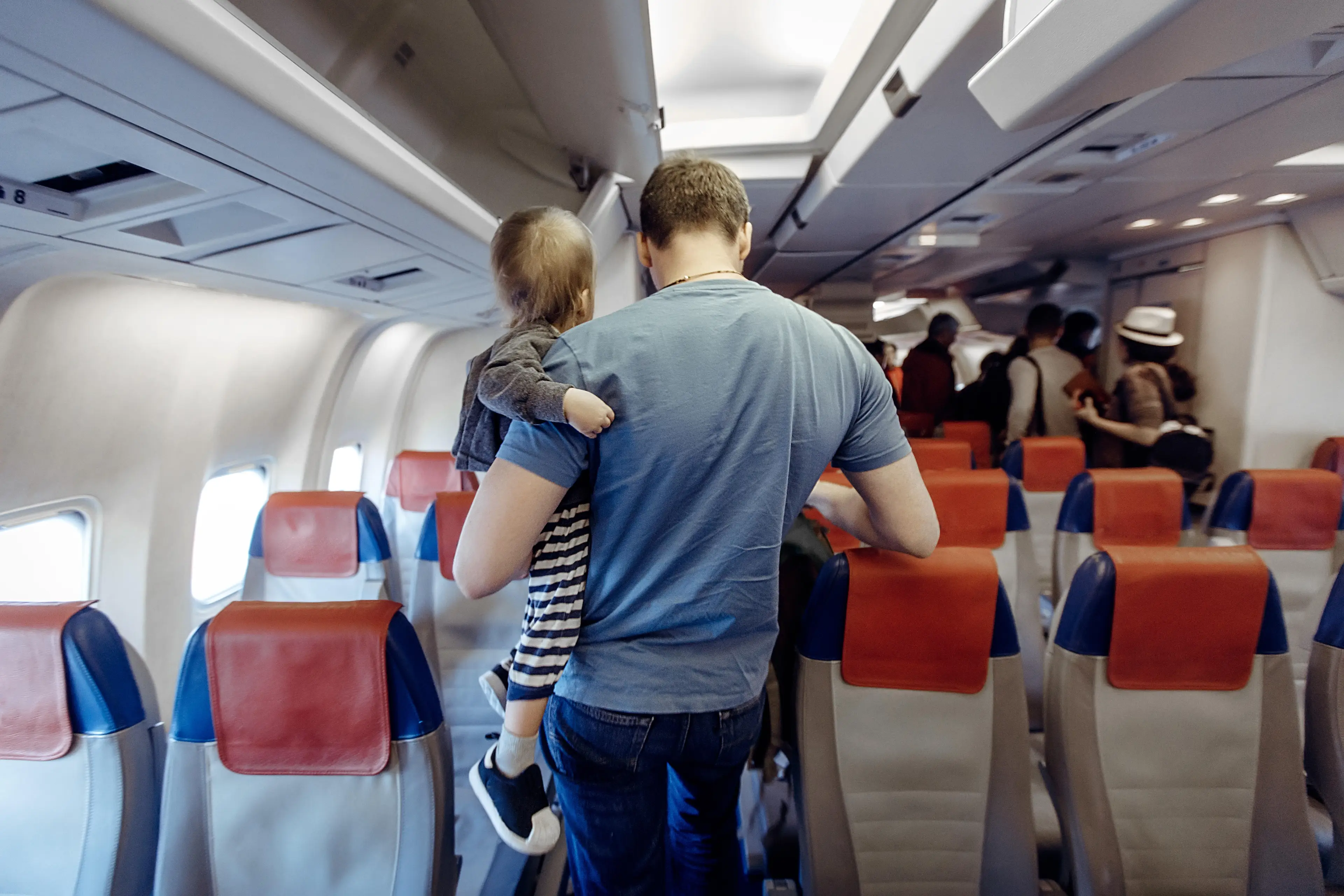 The 22-year-old eventually asked the father to move his little girl from her seat.