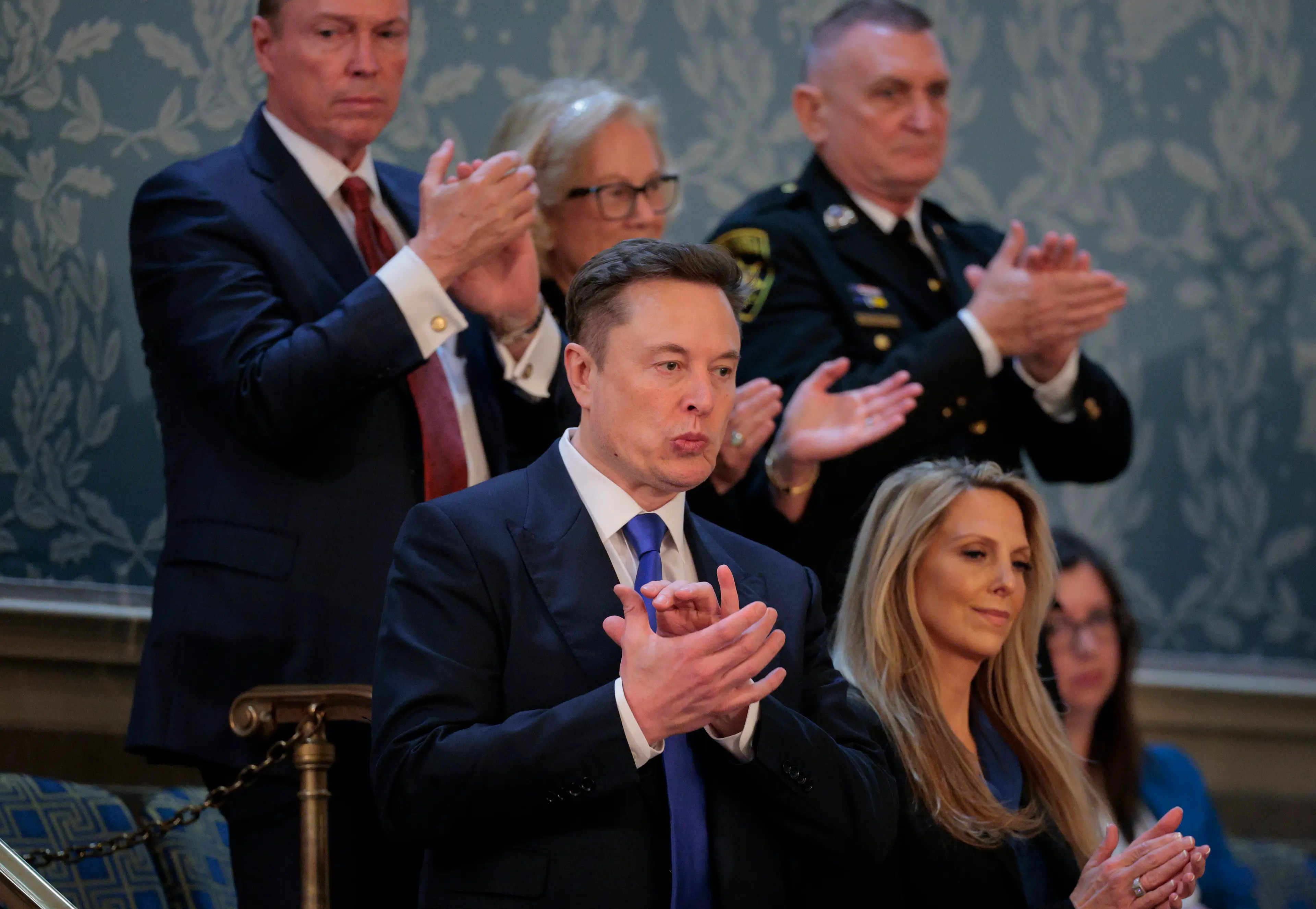 The woman has since been revealed to be aesthetician Heather Valentino (Chip Somodevilla/Getty Images)