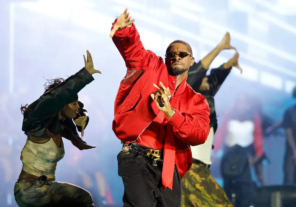 Fans were insistent that it wasn't the real Usher onstage (Photo by Jason Kempin/Getty Images)
