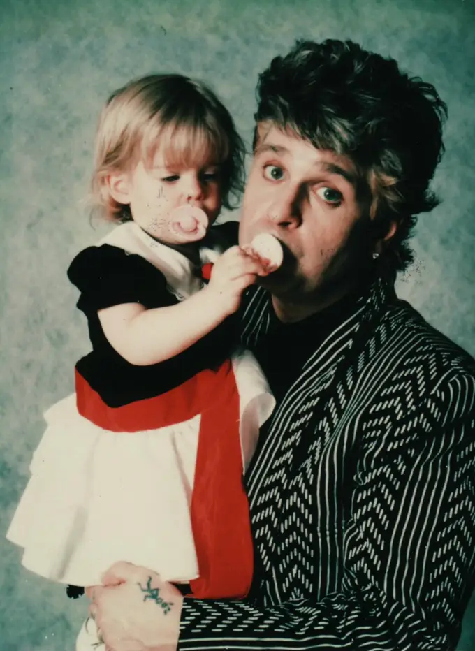 Kelly shared several childhood photos alongside her father (Instagram/@kellyosbourne)