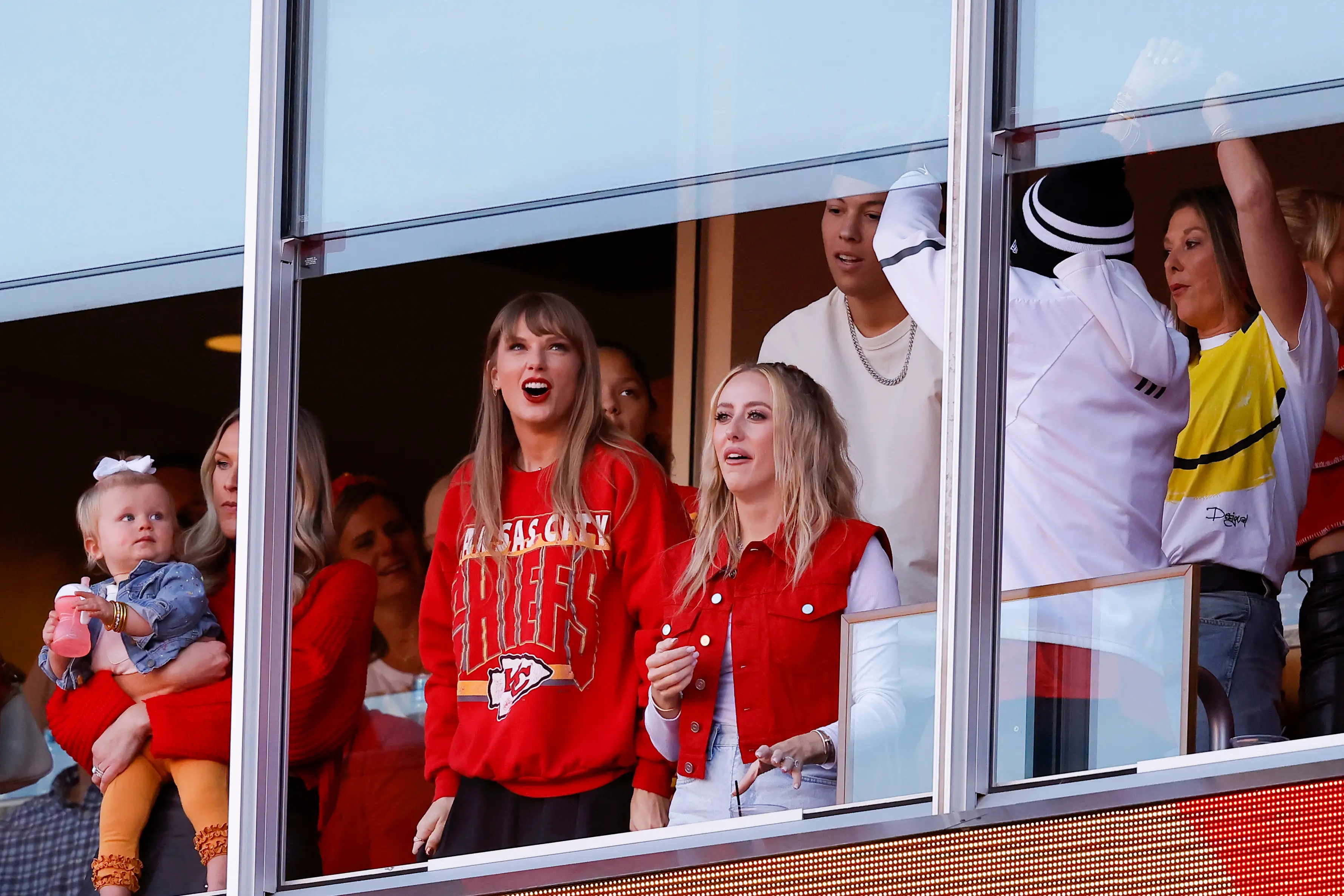 Taylor supporting Travis at last night's NFL game.